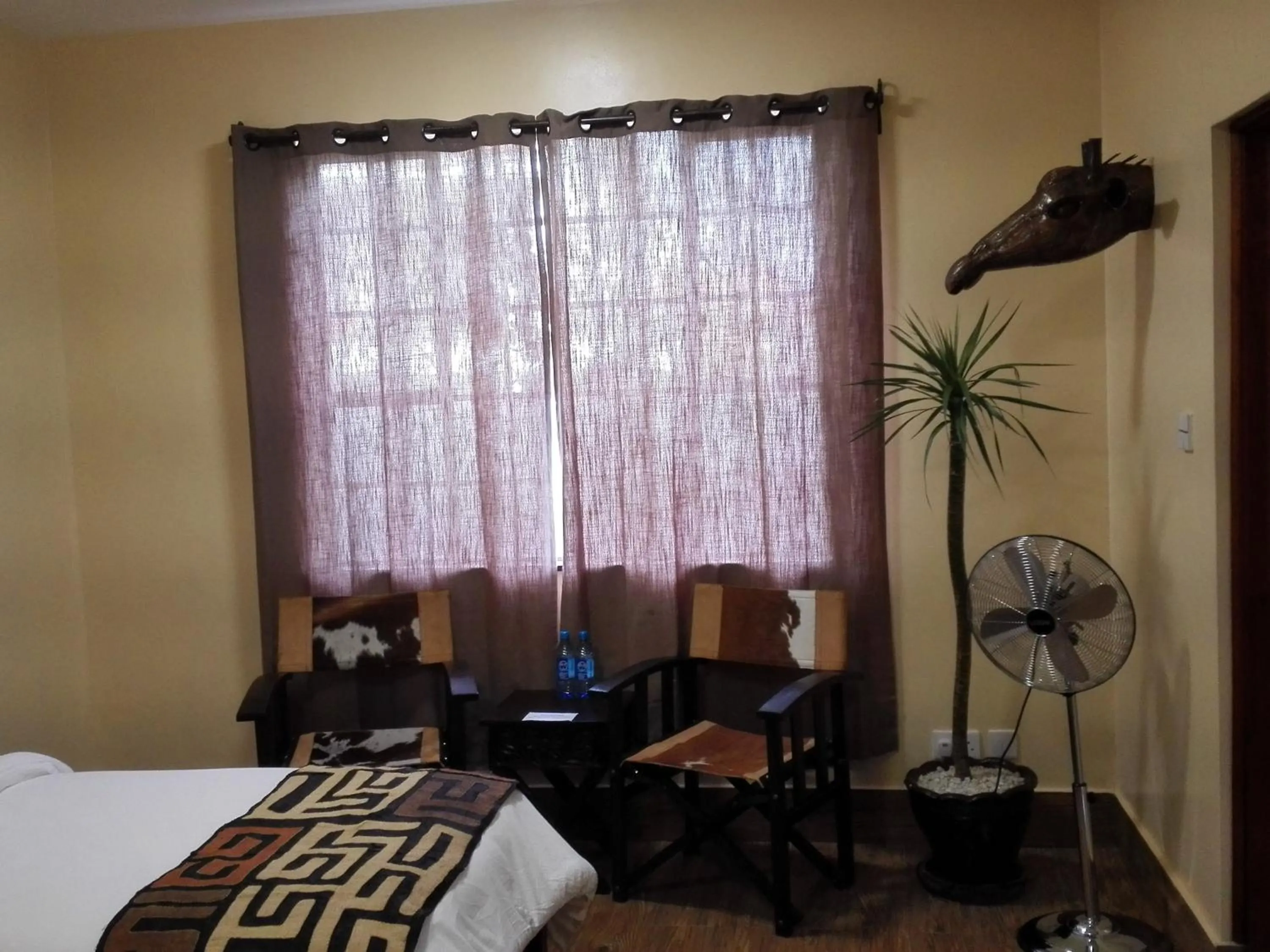 hair dresser, Bed in Acacia Tree Lodge