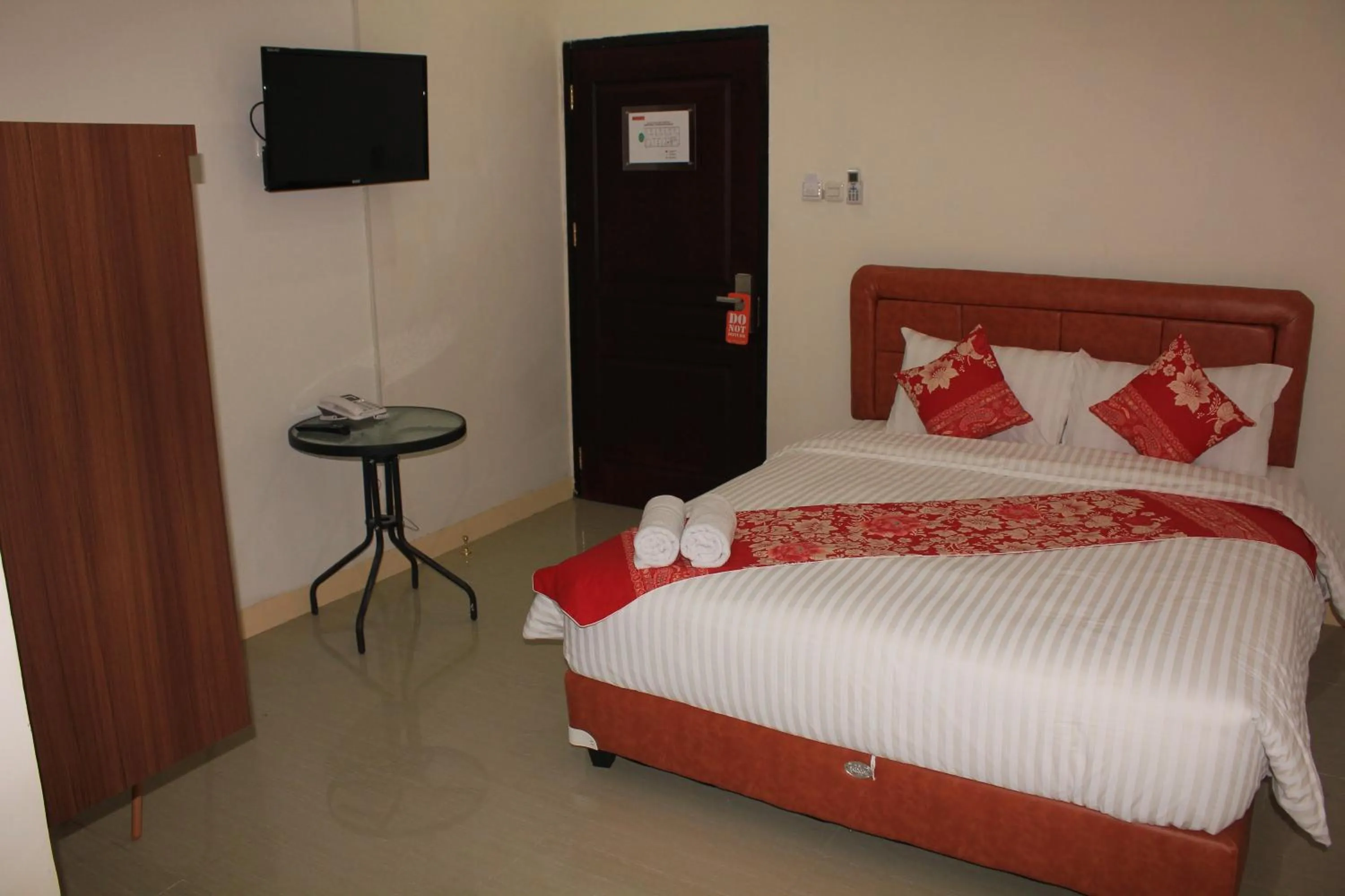 Bed in Mel's Inn Manado