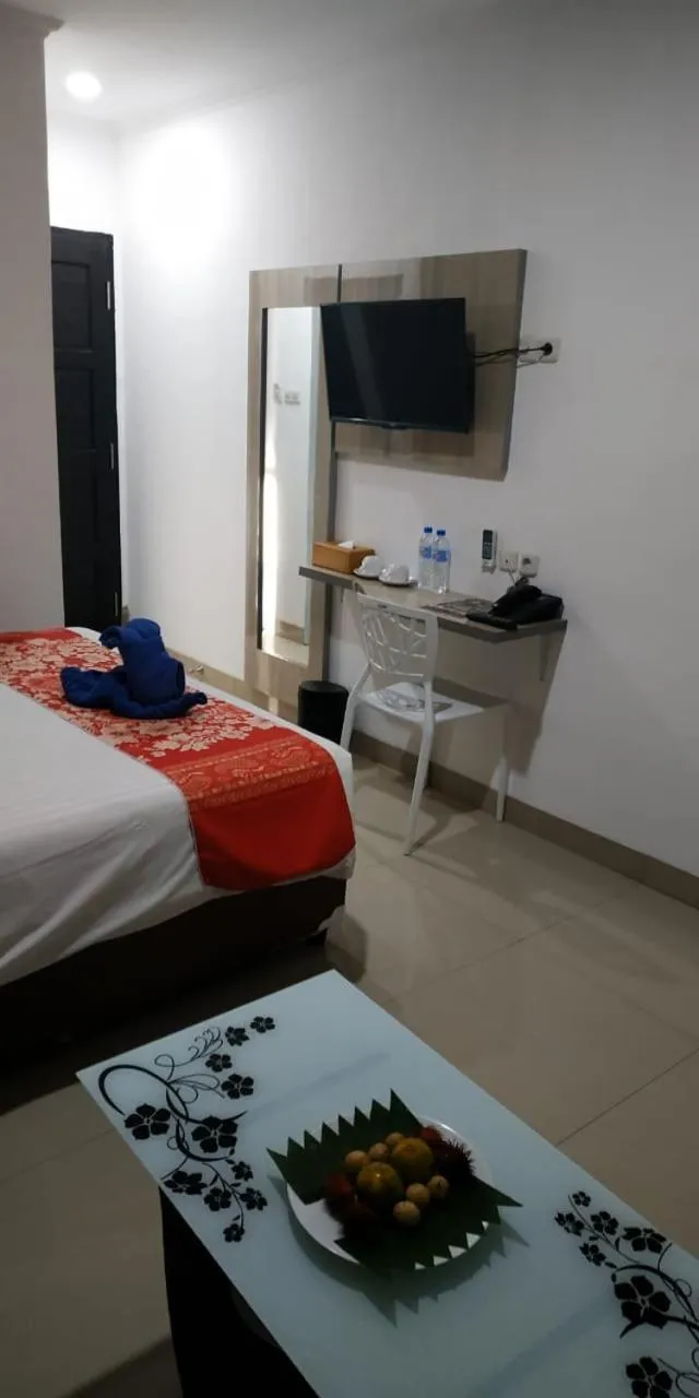 Bed in Mel's Inn Manado