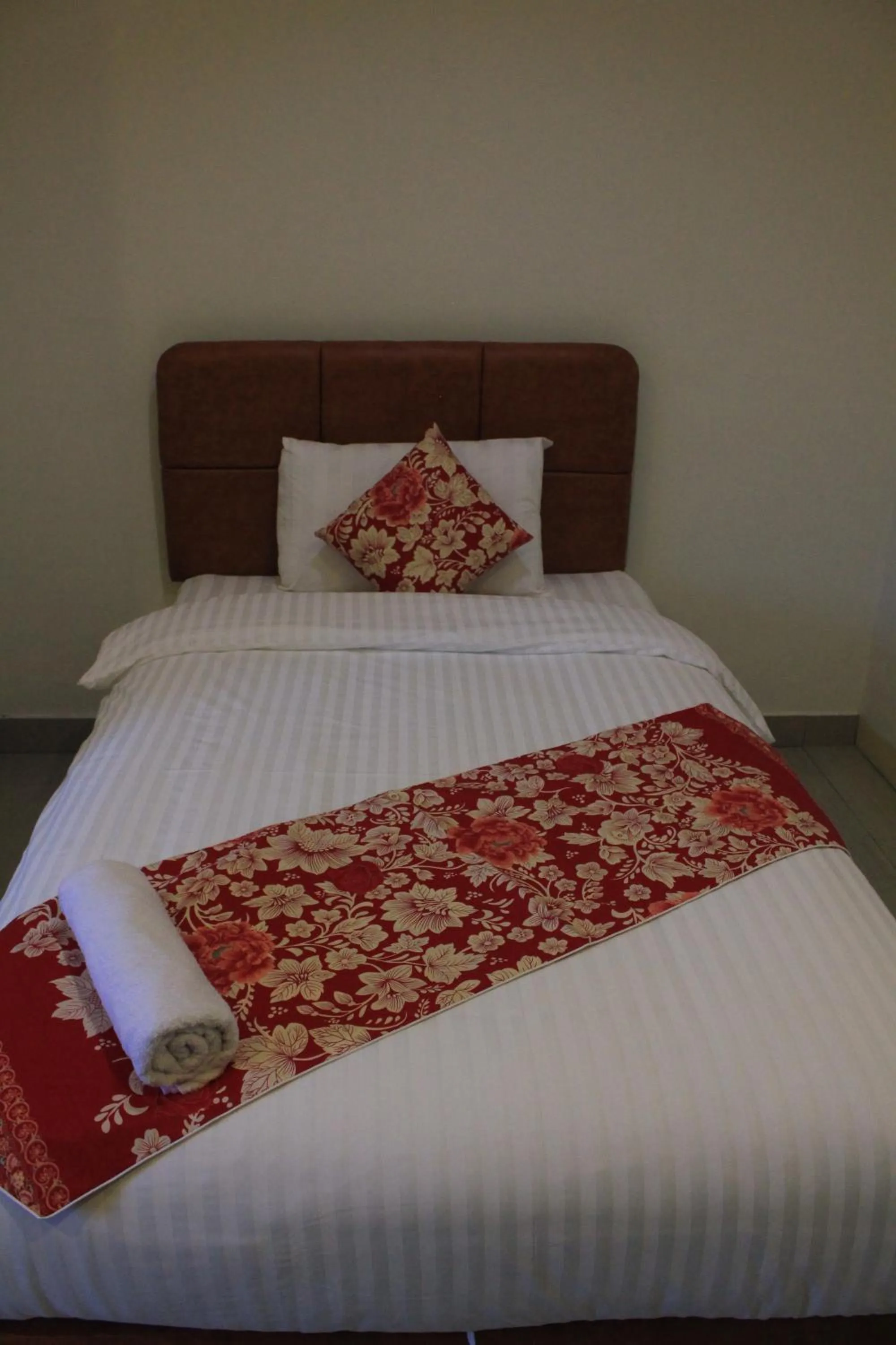Bed in Mel's Inn Manado