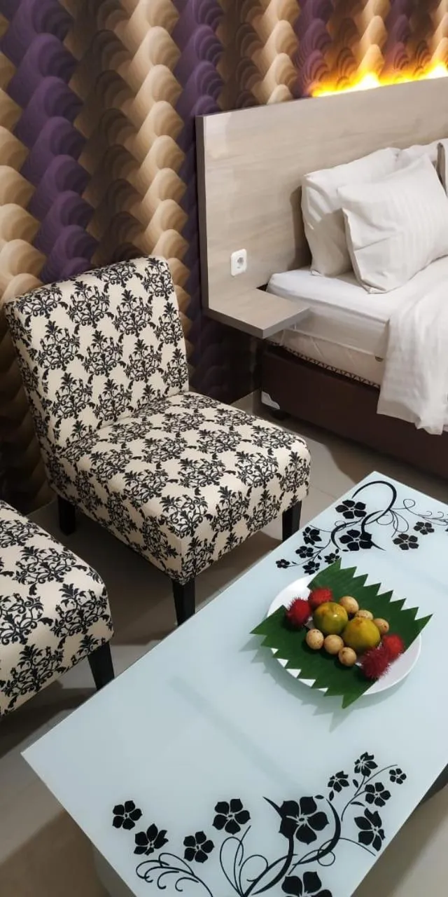 Bed in Mel's Inn Manado