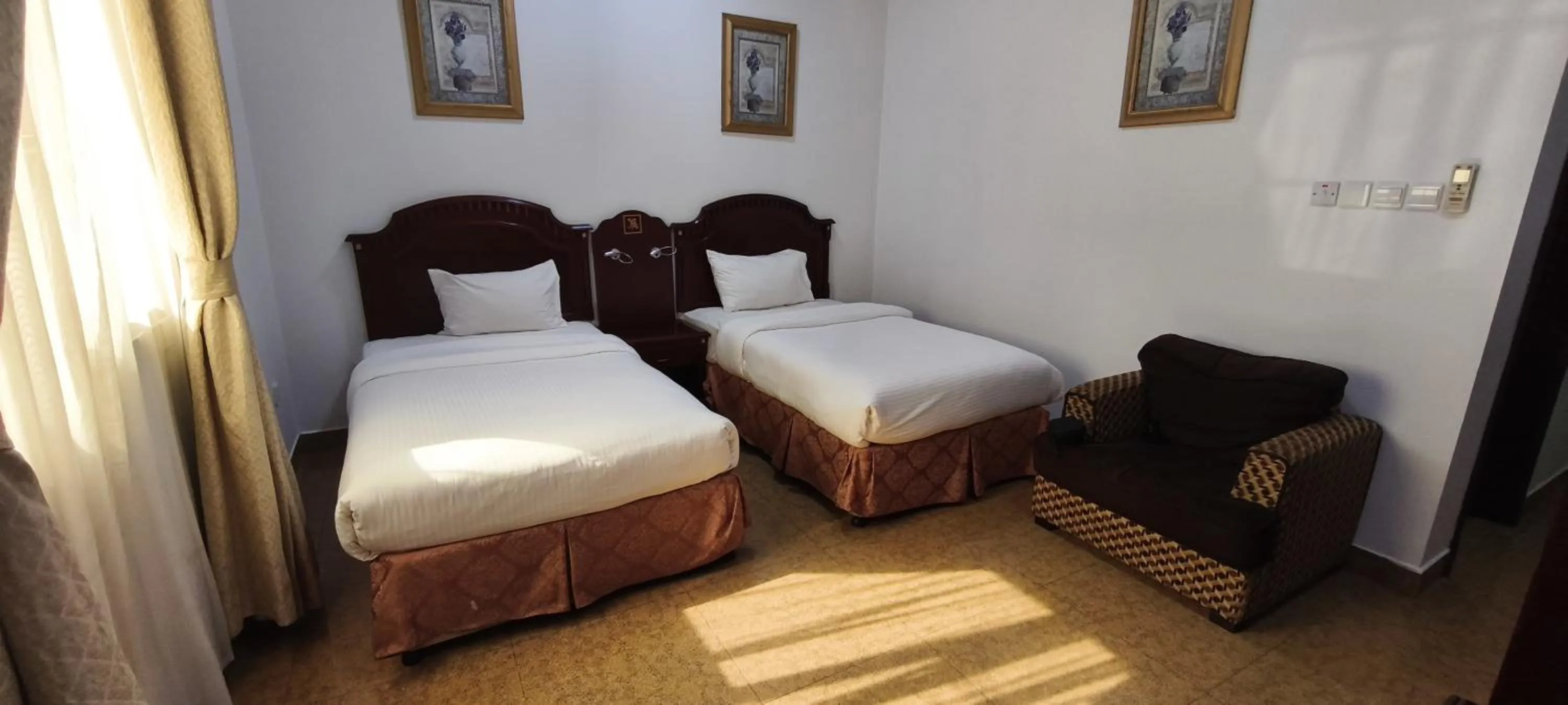 Bed in Safeer International Hotel By Brothers International