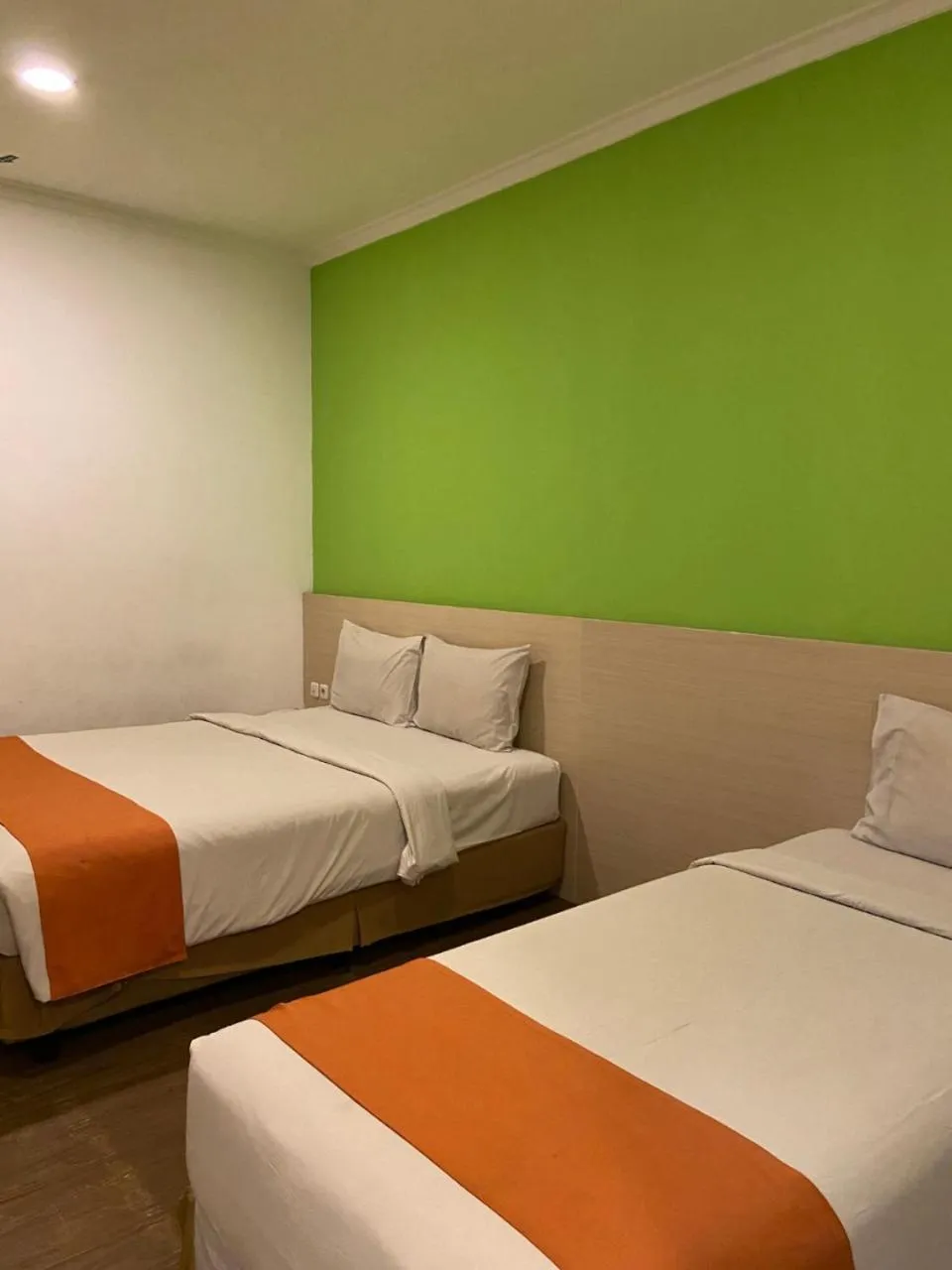 Bed in Green Red Hotel Syariah Jombang
