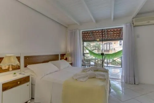Photo of the whole room, Bed in Villas Jurerê Hotel Boutique