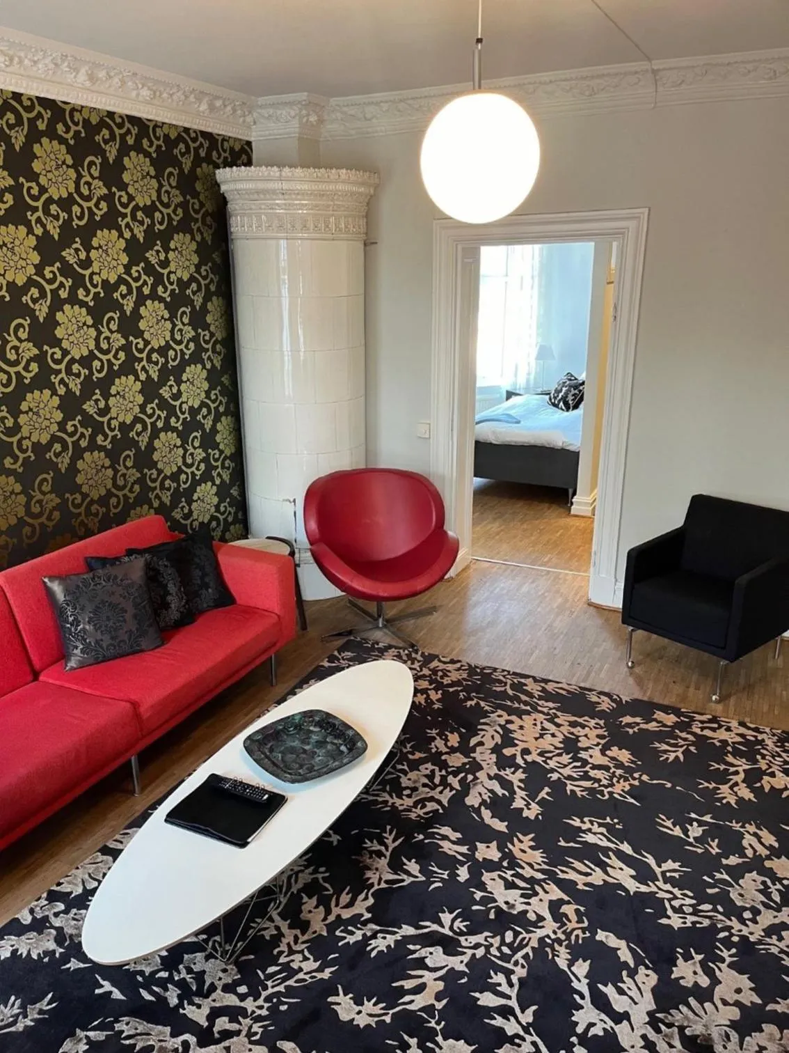 Living room, Bed in DA Hotel Apartments