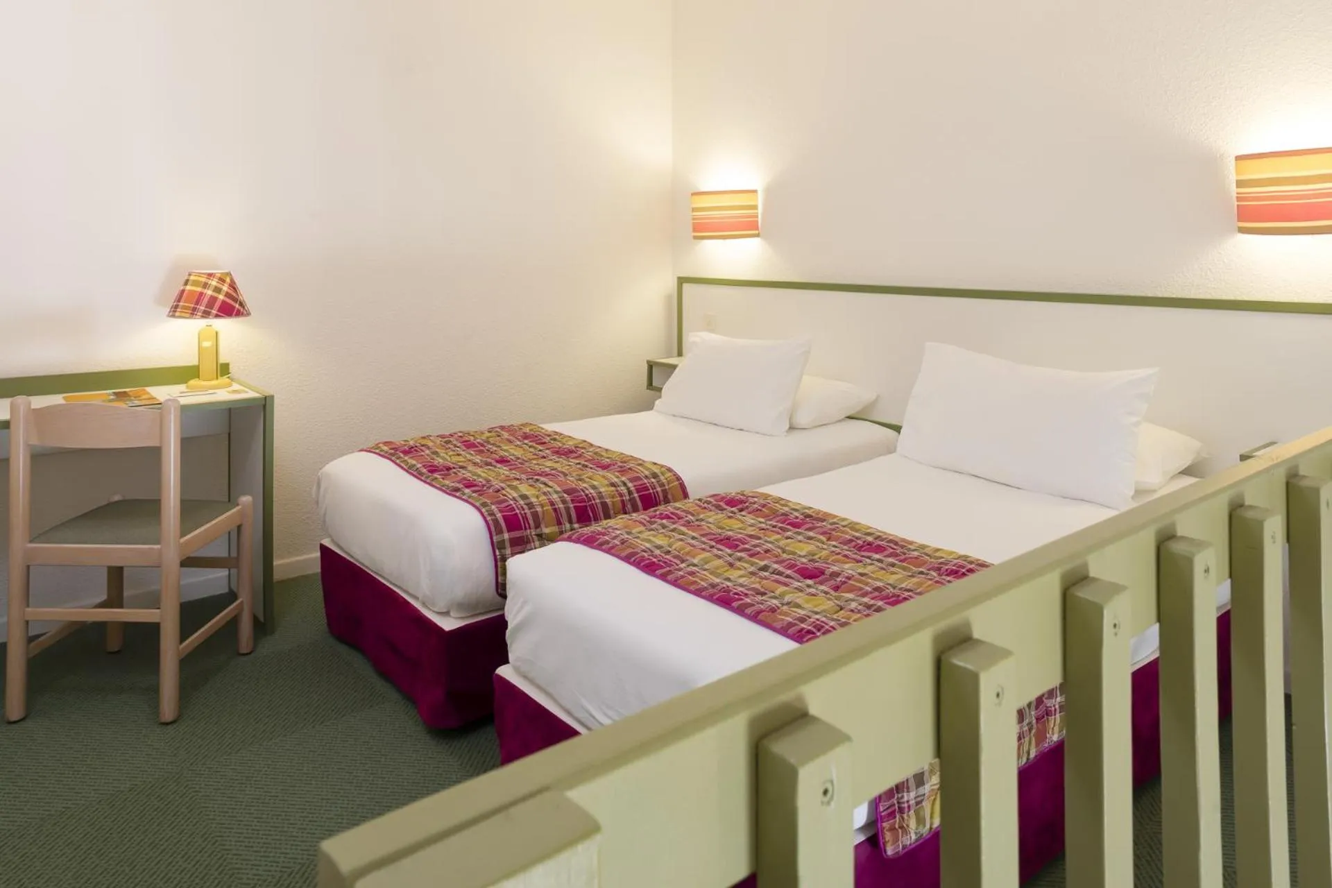 Bedroom in Logis Hôtel Restaurant Les Cèdres