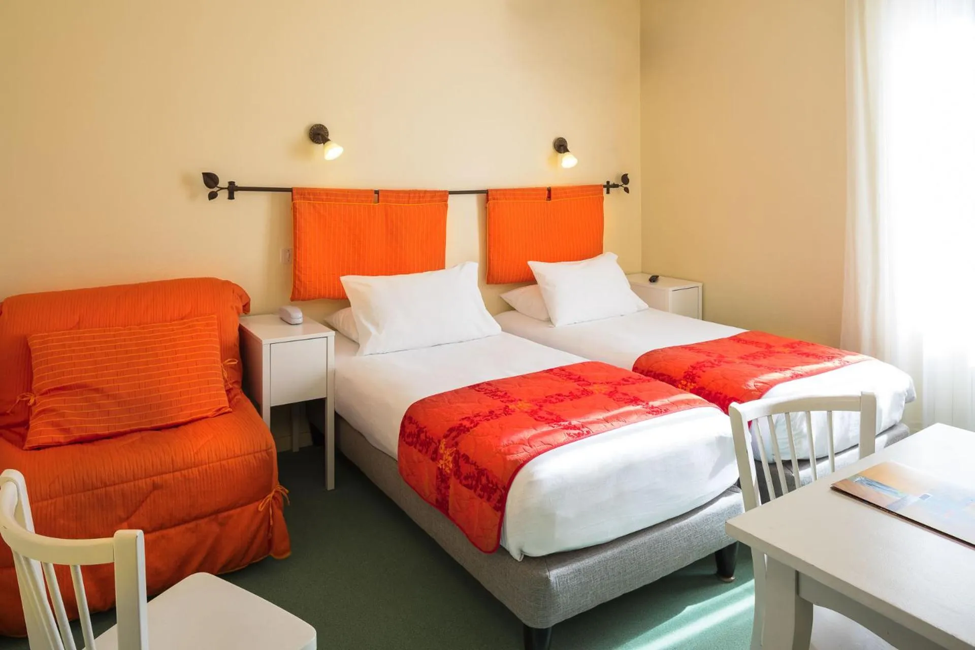 Photo of the whole room in Logis Hôtel Restaurant Les Cèdres