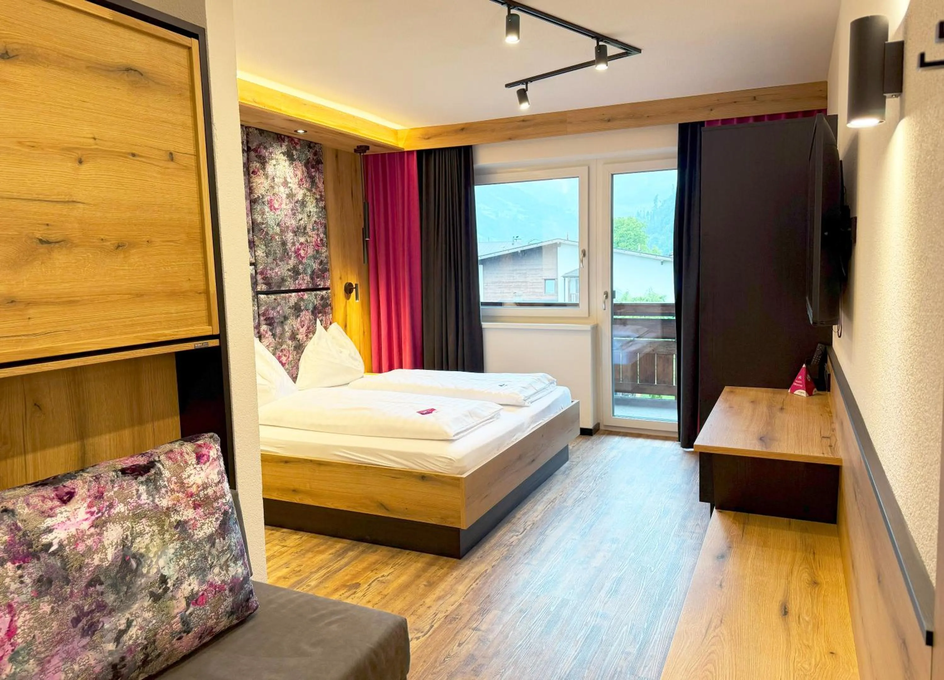 Bedroom, Bed in first mountain Hotel Zillertal