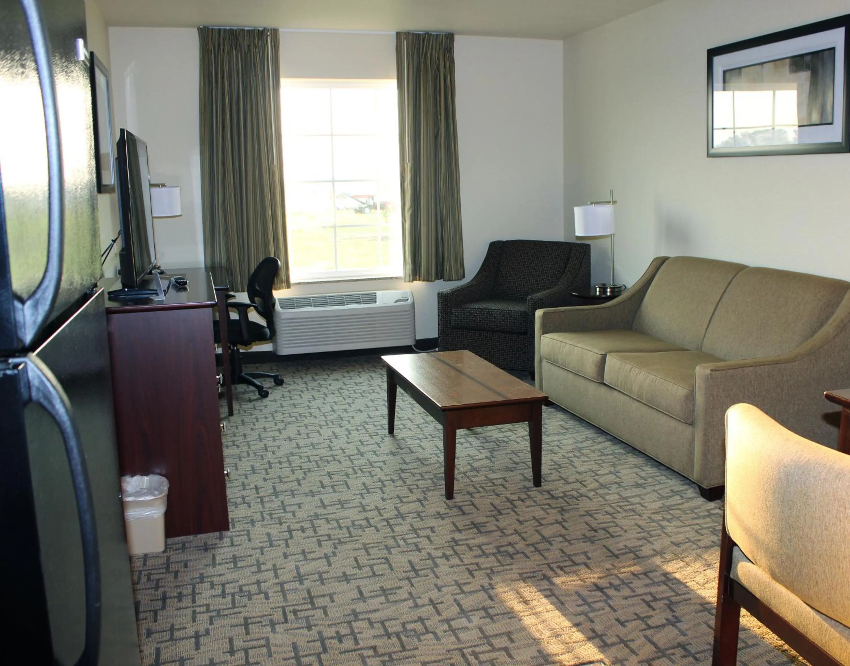 Living room in Cobblestone Inn & Suites - Lamoni