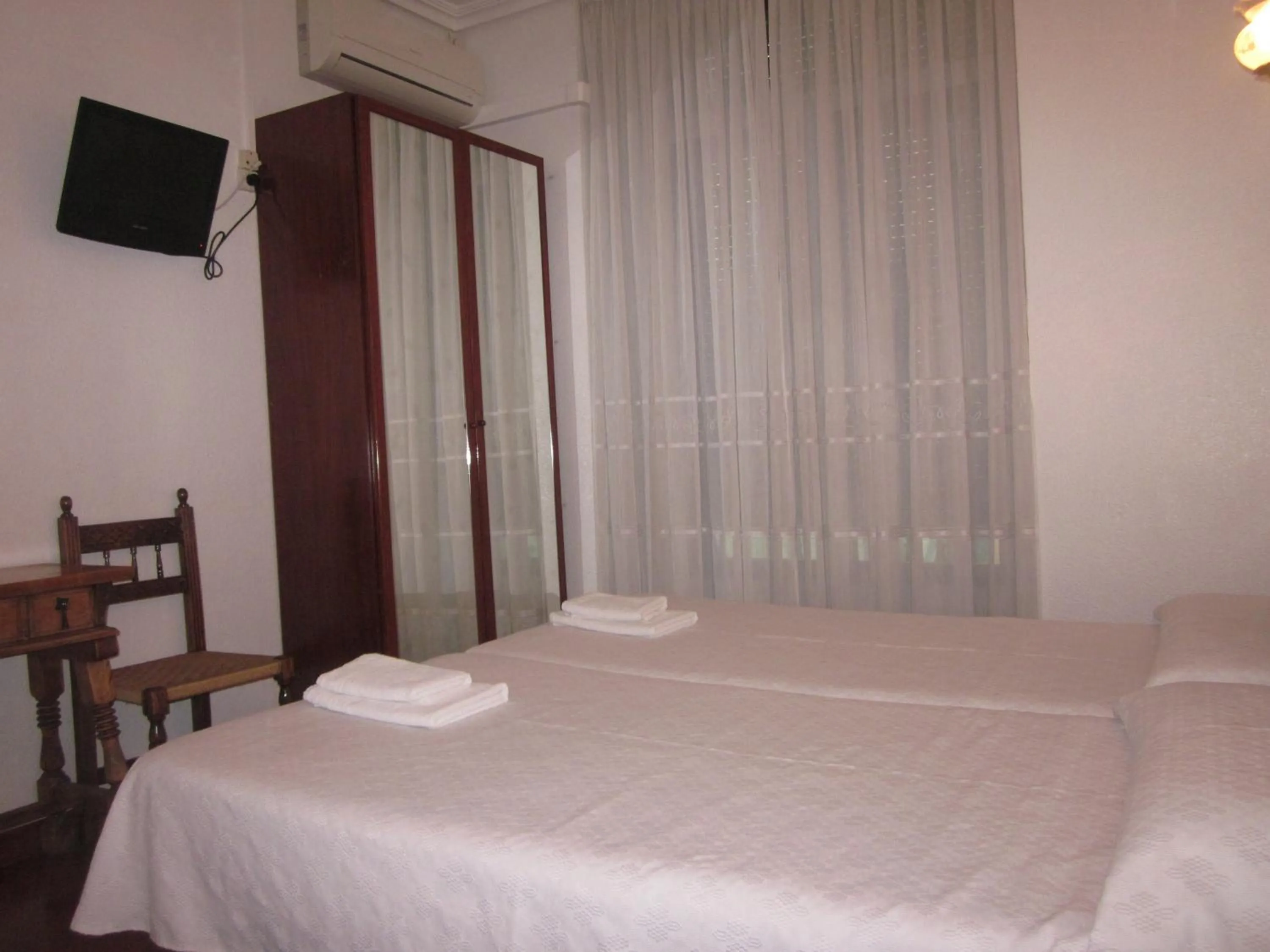 Bed in Hostal Esmeralda