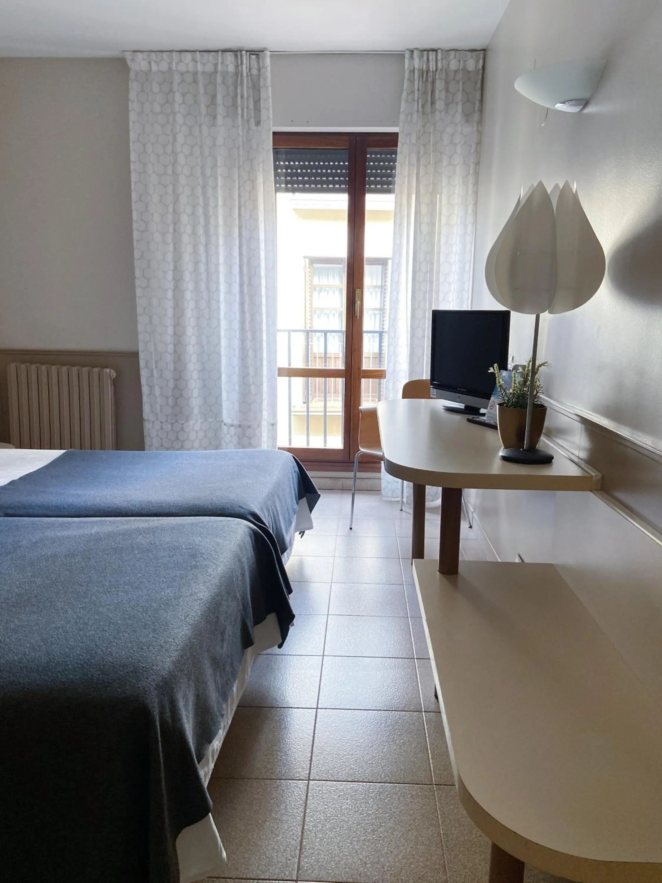 Photo of the whole room, Bed in Hotel Rio Arga