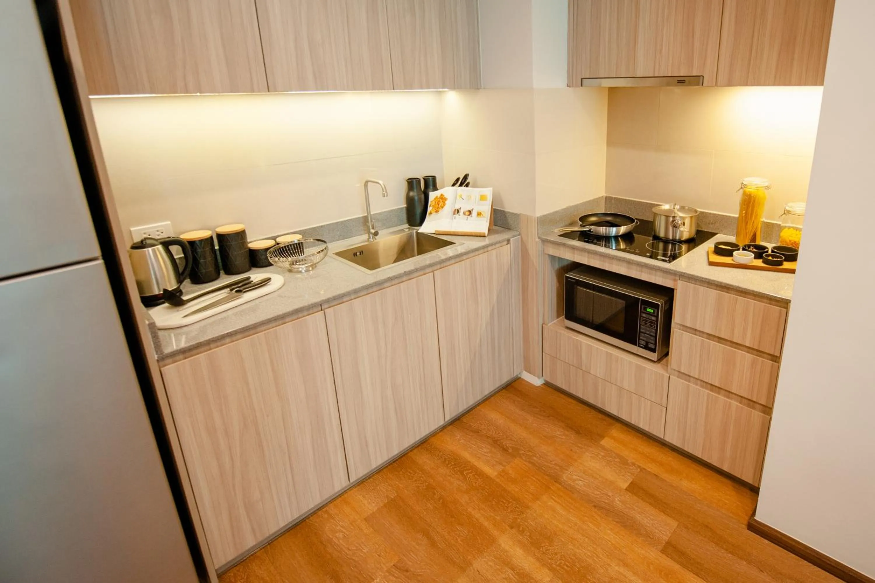 Kitchen or kitchenette in Oakwood Hotel & Residence Sri Racha