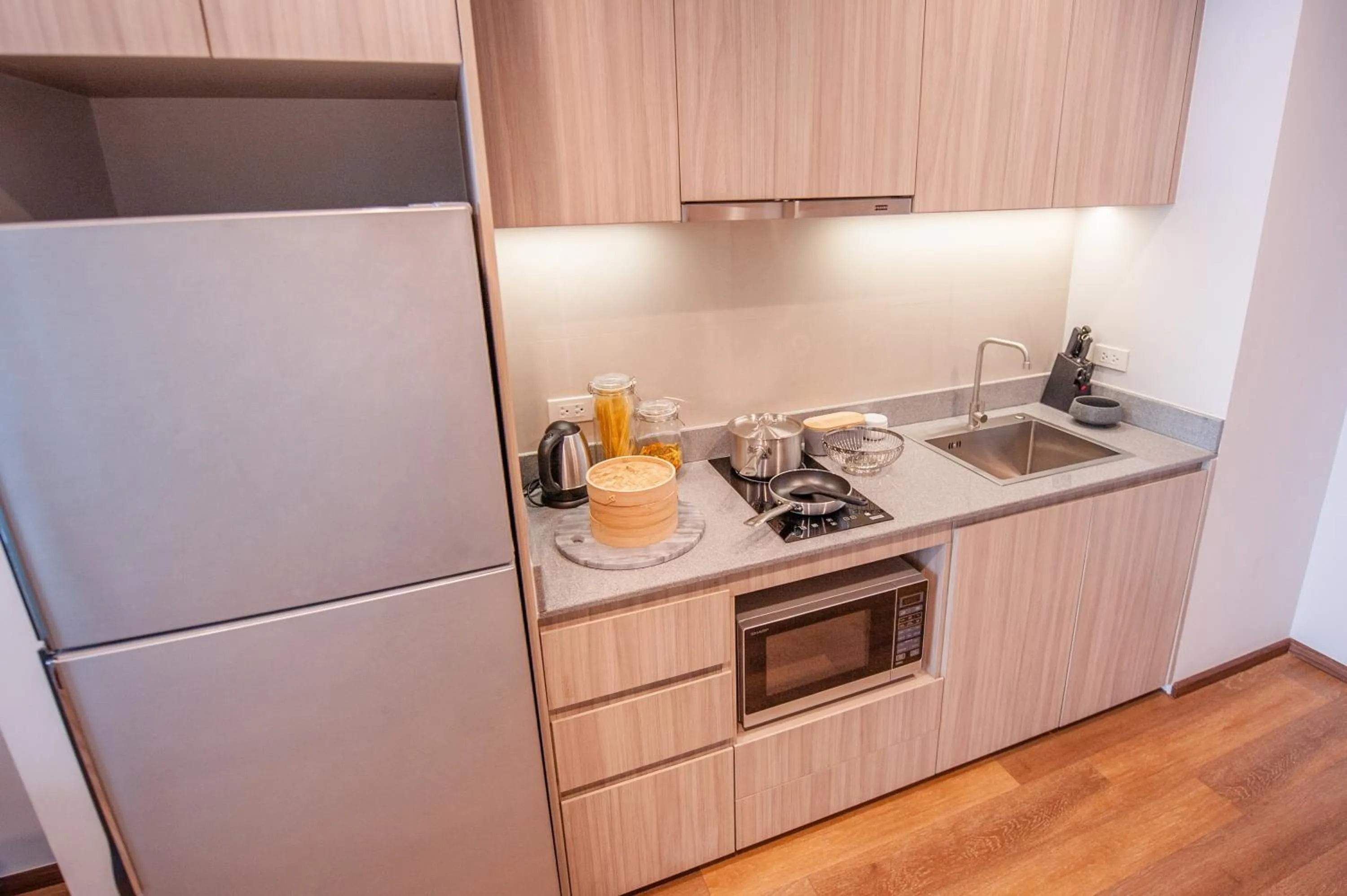 Kitchen or kitchenette in Oakwood Hotel & Residence Sri Racha