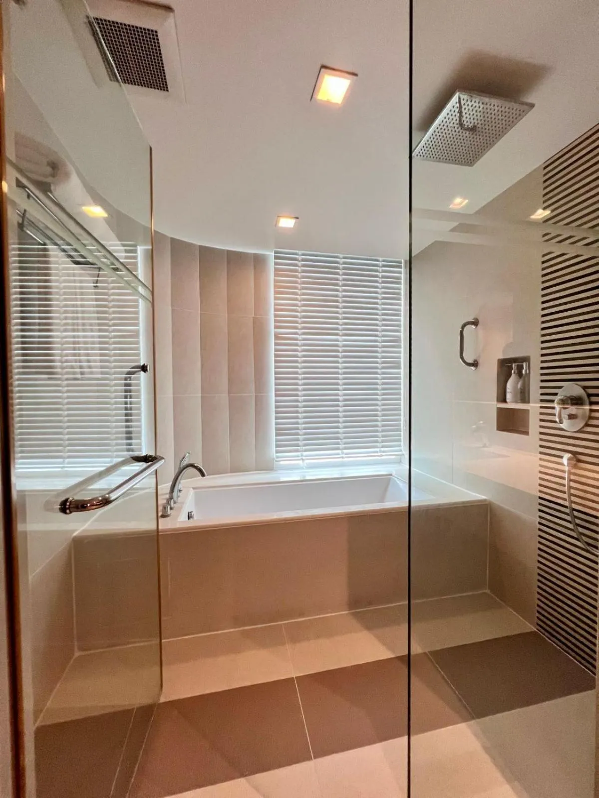 Shower in Sora Resort & Suites Sukhumvit