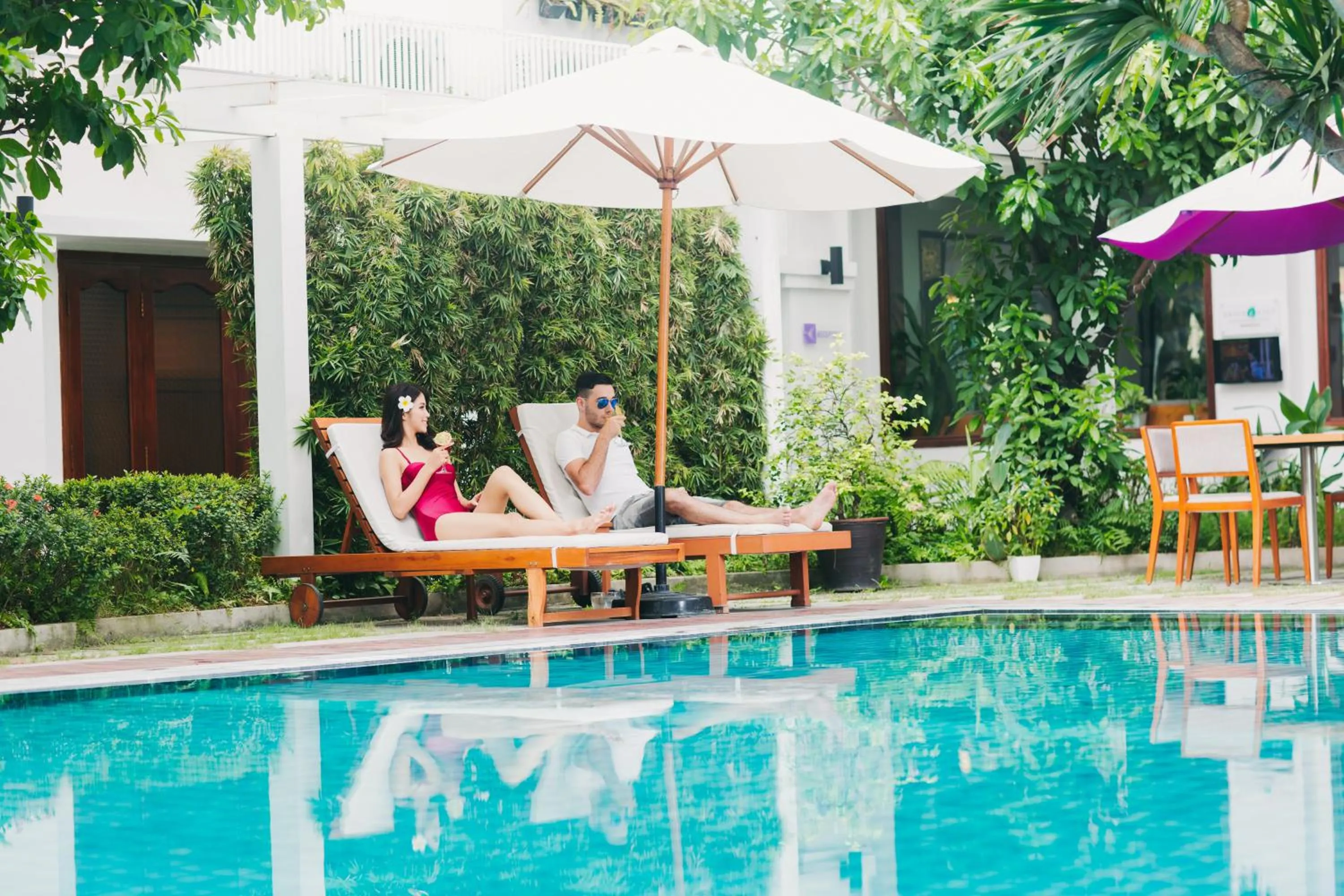 Swimming pool in ÊMM Hotel Hue