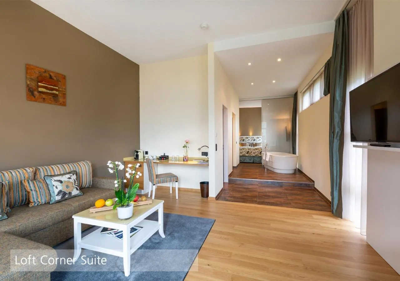 Living room, Bed in Lenkerhof gourmet spa resort - Relais & Châteaux