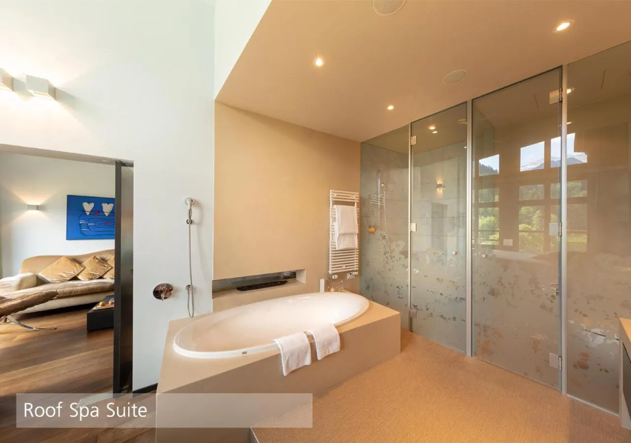 Bathroom, Bed in Lenkerhof gourmet spa resort - Relais & Châteaux