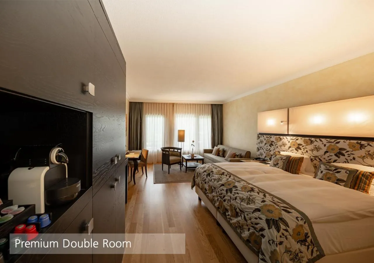 Bedroom, Bed in Lenkerhof gourmet spa resort - Relais & Châteaux