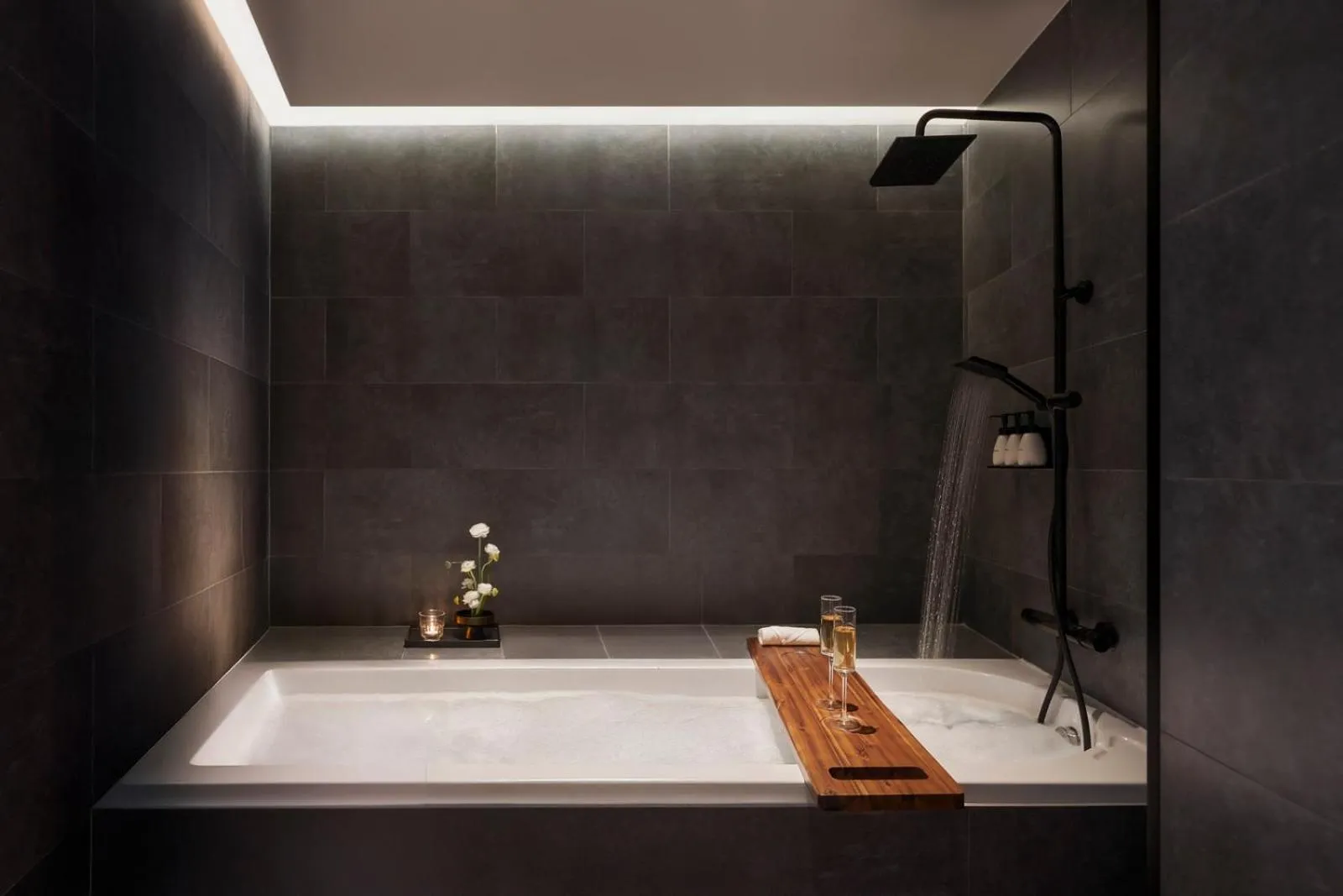 Shower in M Village Hotel Premier Thi Sách