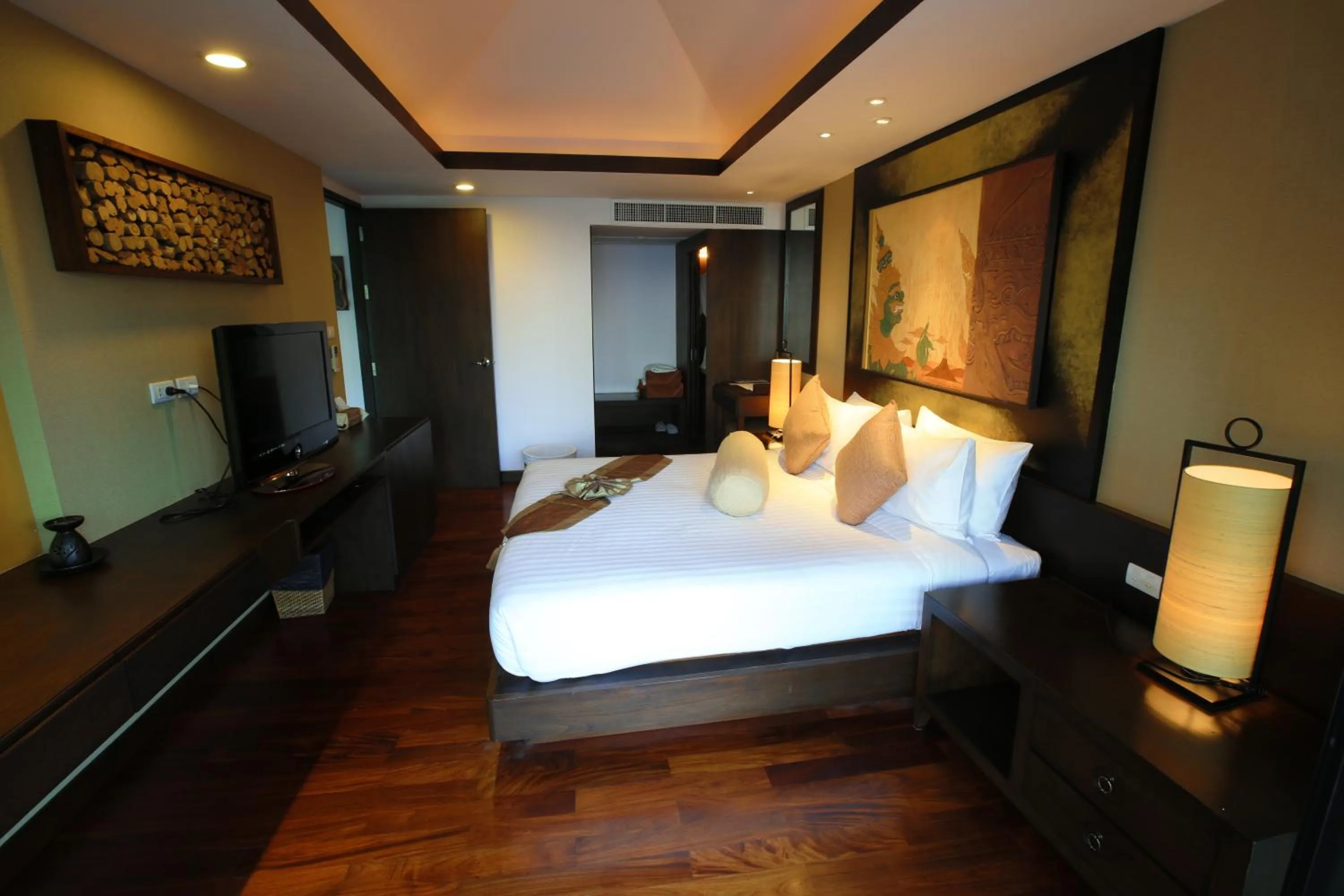 Photo of the whole room, Bed in Niramaya Villa & Wellness