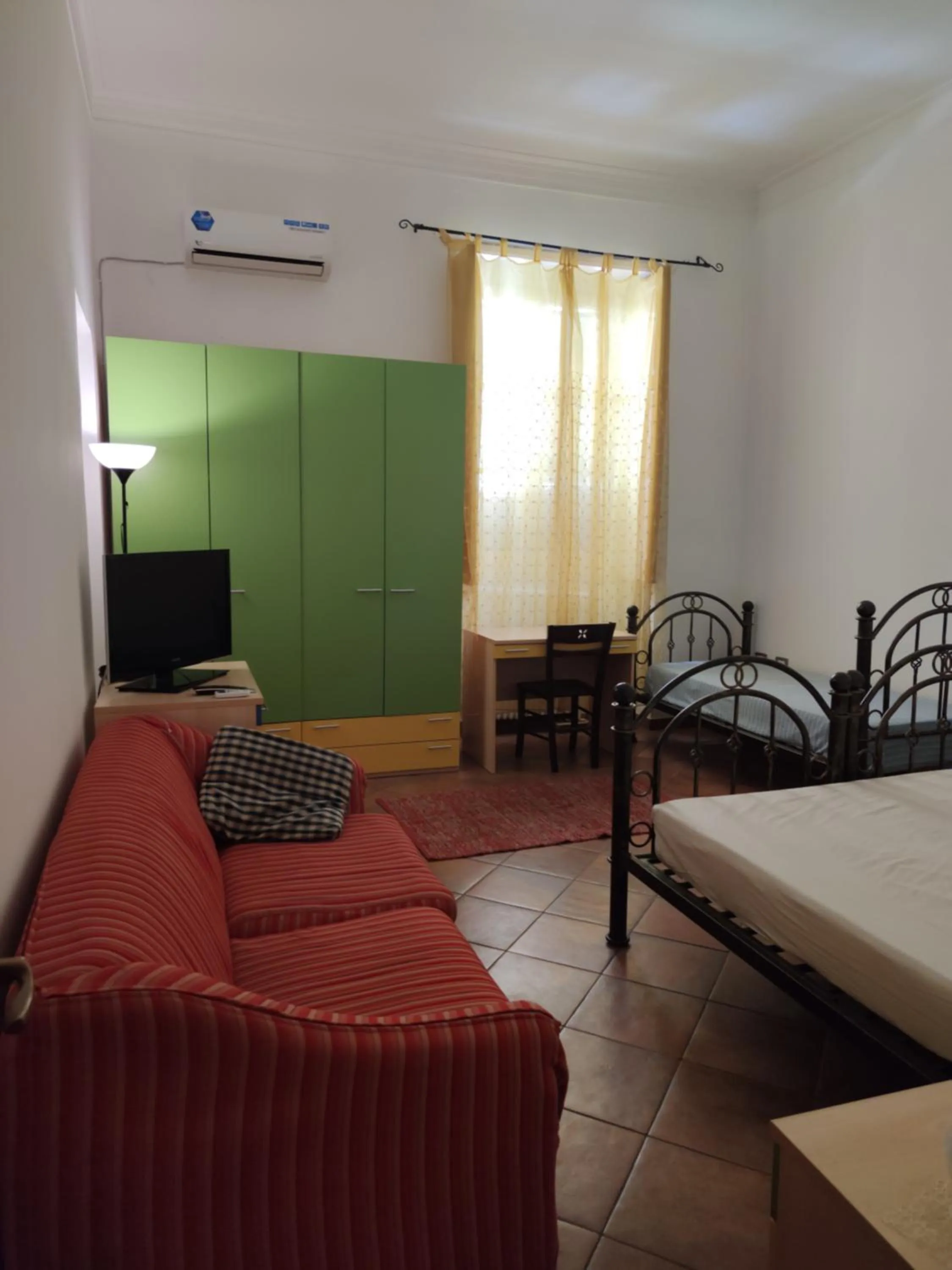 Bed in Guglielmo room's B&B