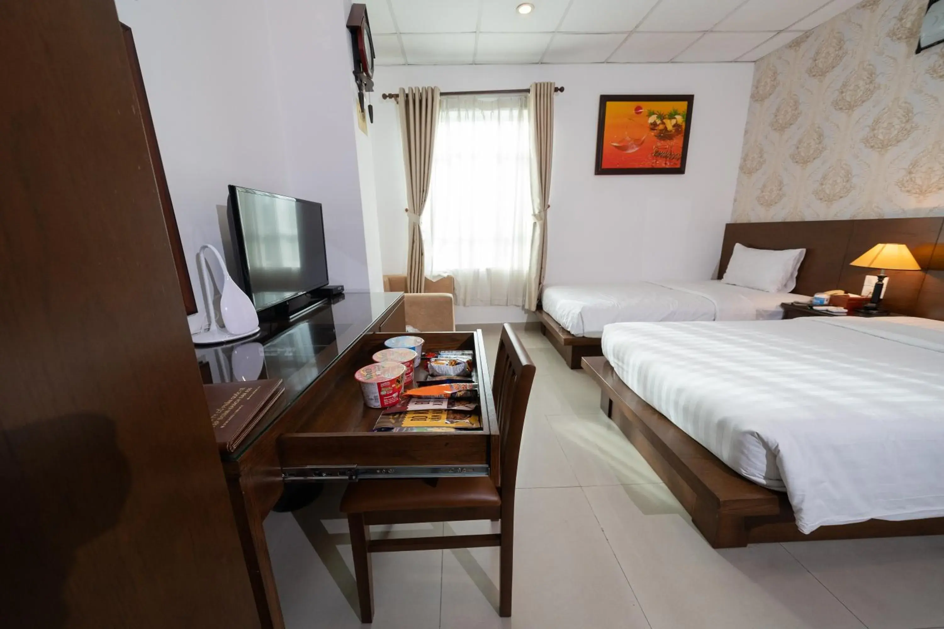 Deluxe Double or Twin Room with City View in A25 Hotel - 29 Bùi Thị Xuân Deluxe Double or Twin Room with City View in A25 Hotel - 29 Bùi Thị Xuân