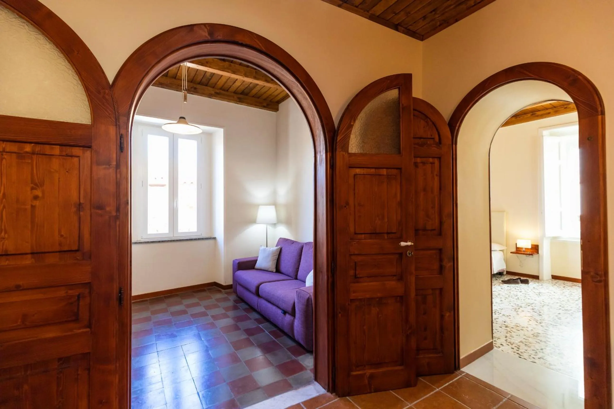 Living room, Bed in Suites Pastis Tropea - Boutique B&B by Kalavrìa Holidays