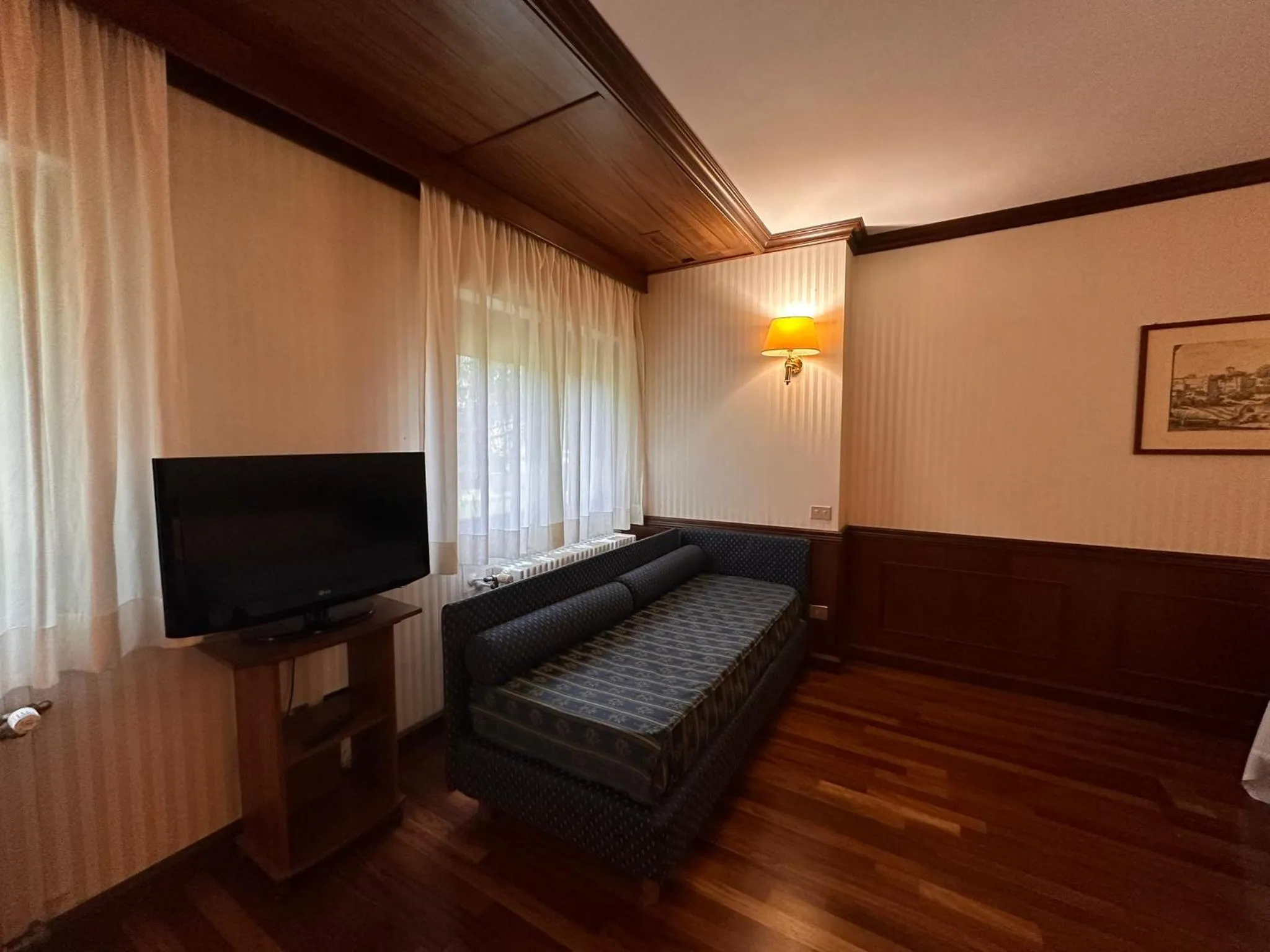 Bedroom in Hotel Corona & Spa