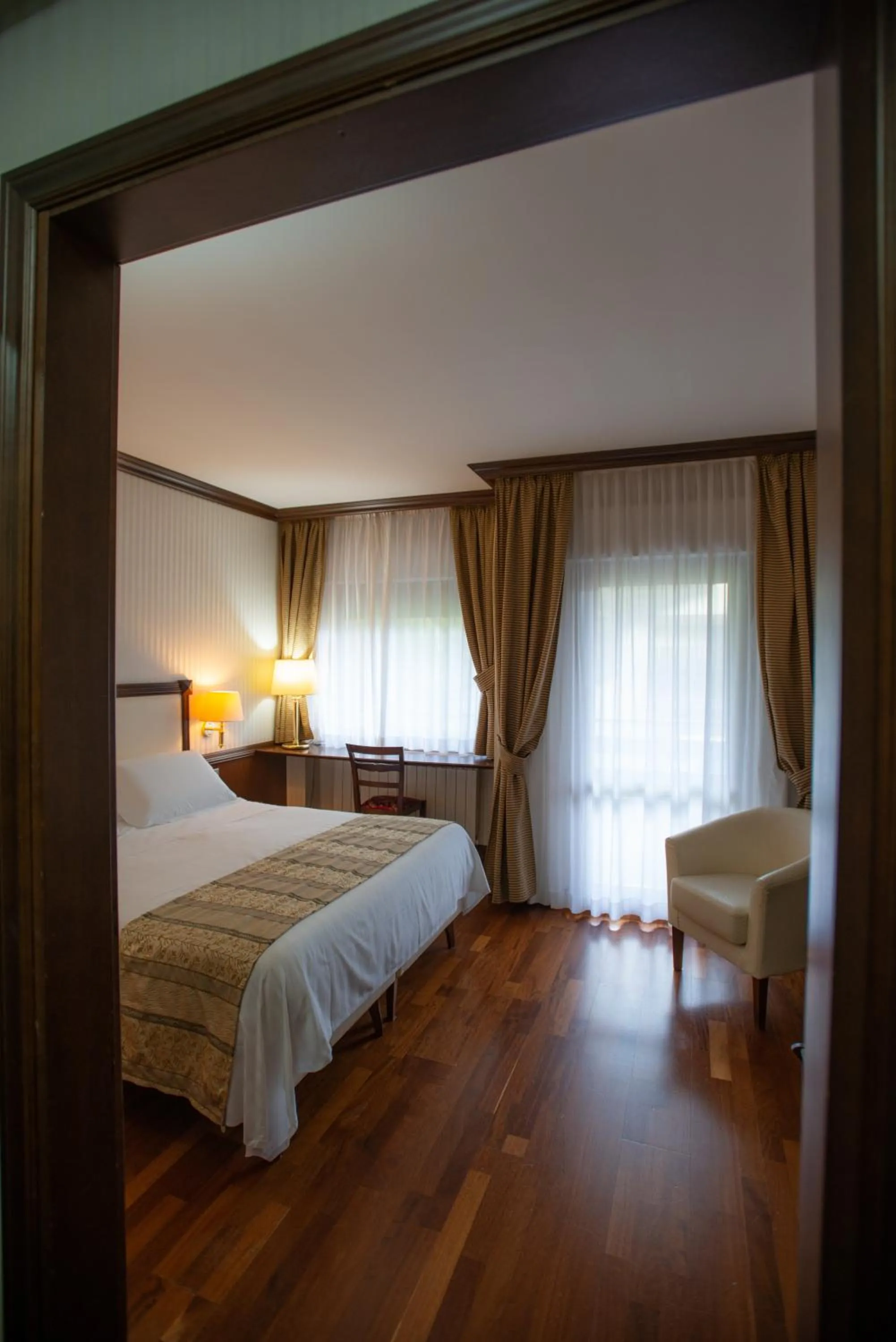 Photo of the whole room, Bed in Hotel Corona & Spa