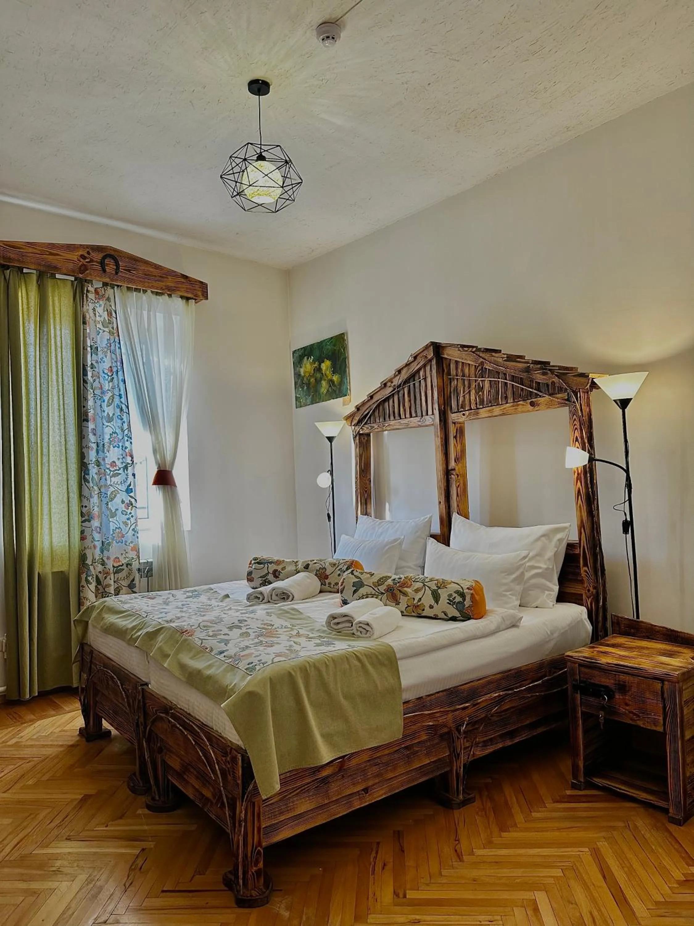 Bed in Machanents Art Hotel