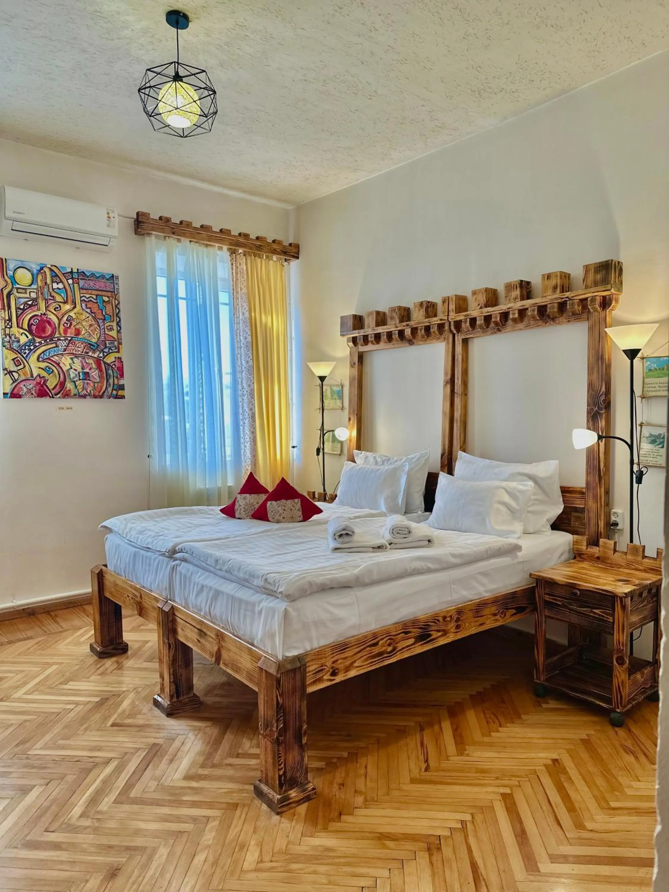 Bed in Machanents Art Hotel