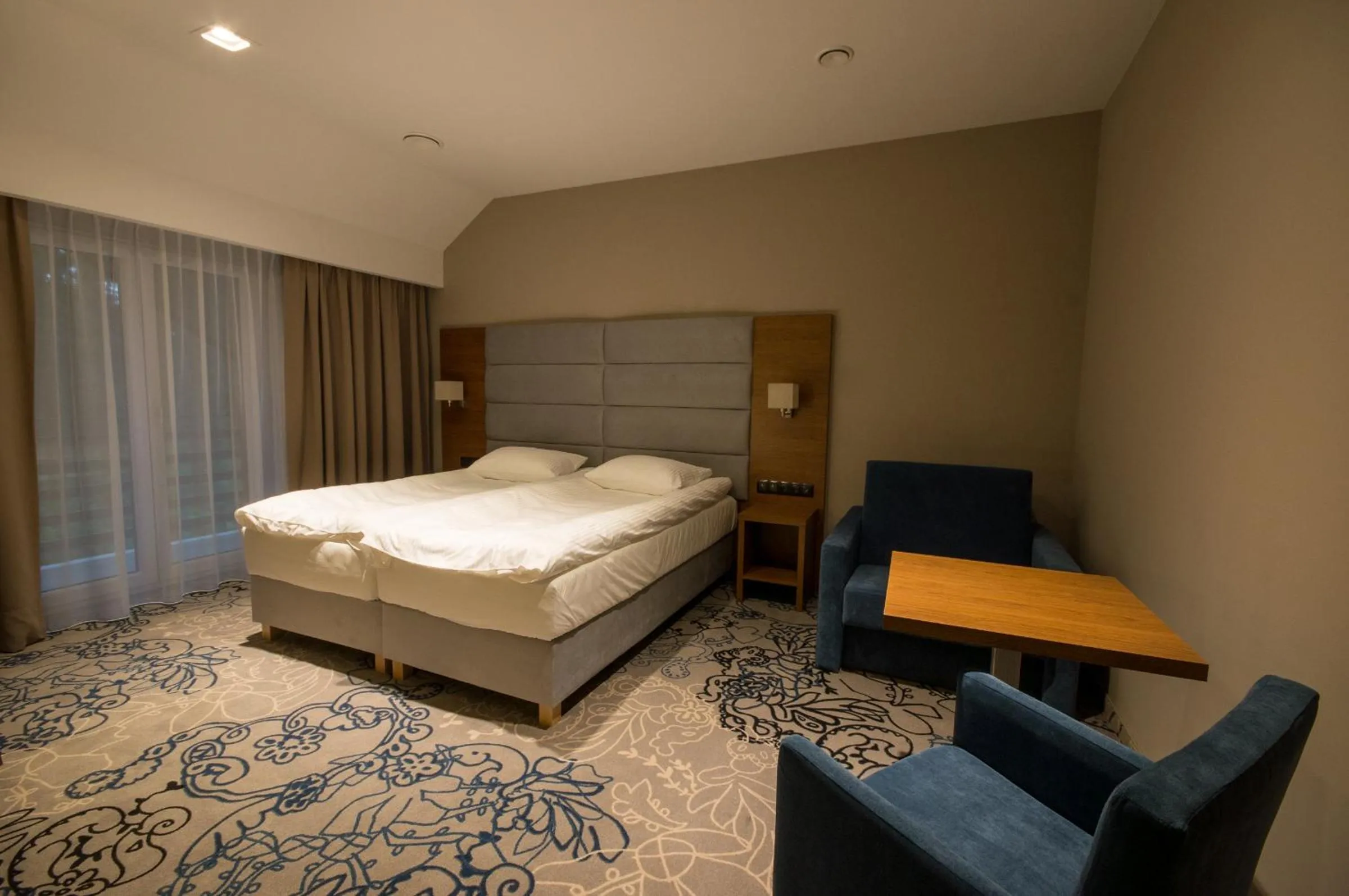 Bed in Rezydencja Sosnowa Luxury Hotel