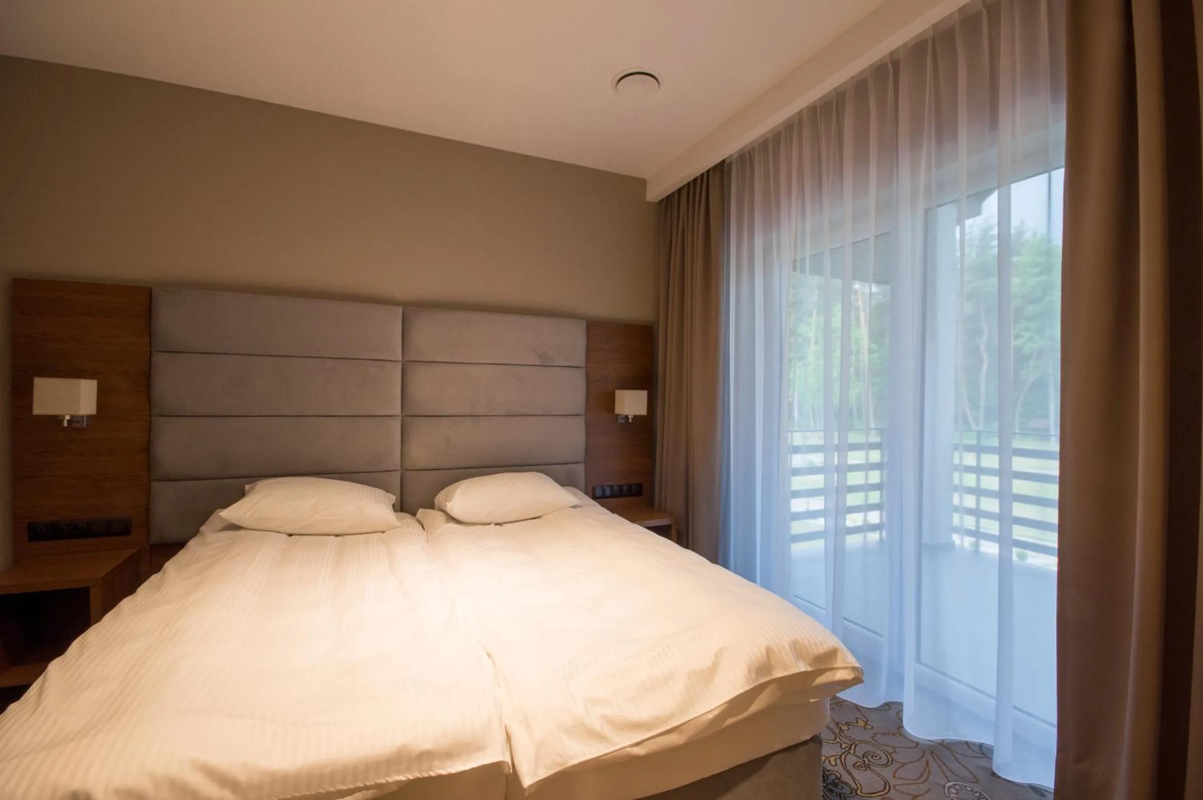 Bed in Rezydencja Sosnowa Luxury Hotel