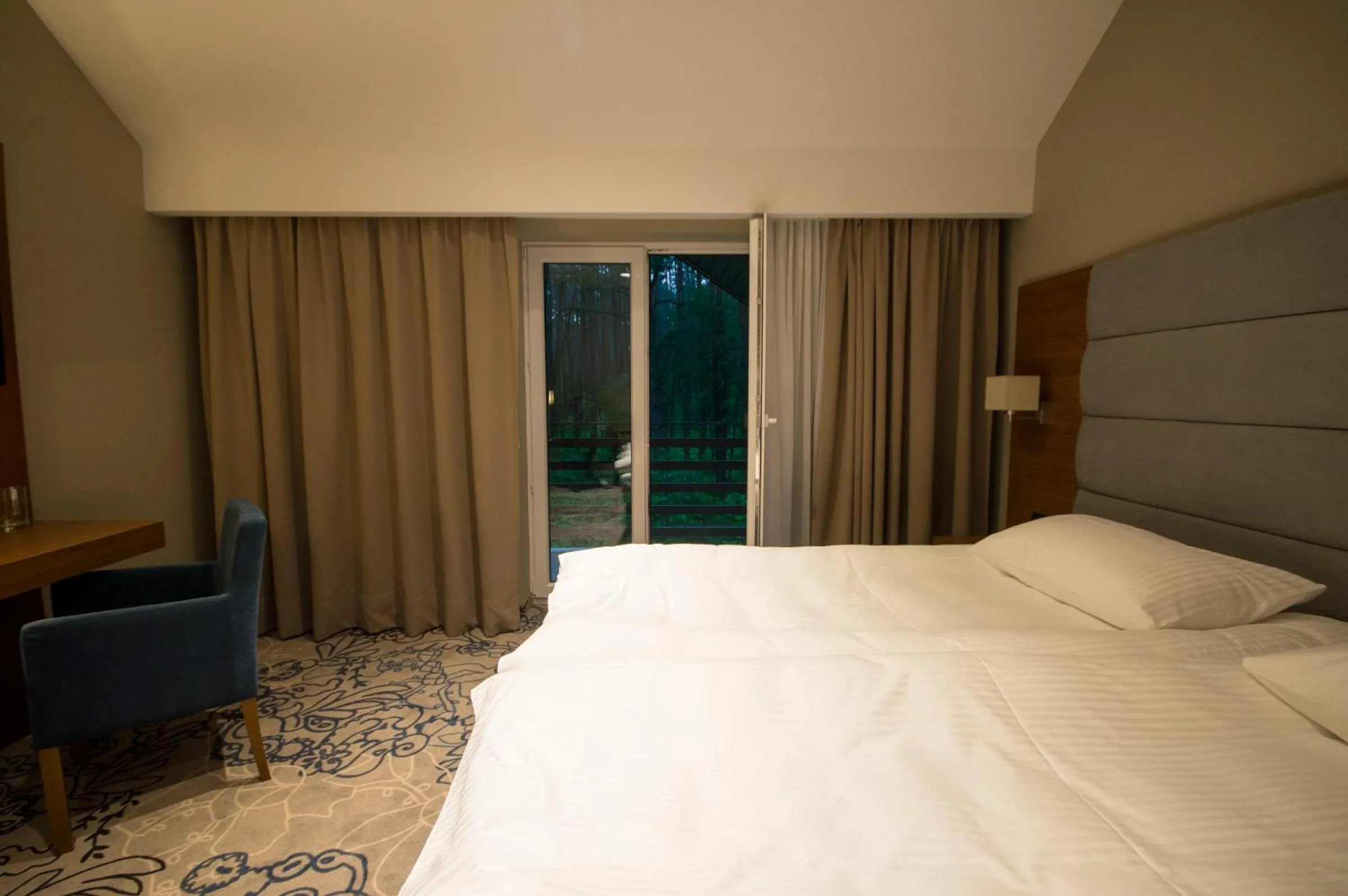 Bed in Rezydencja Sosnowa Luxury Hotel