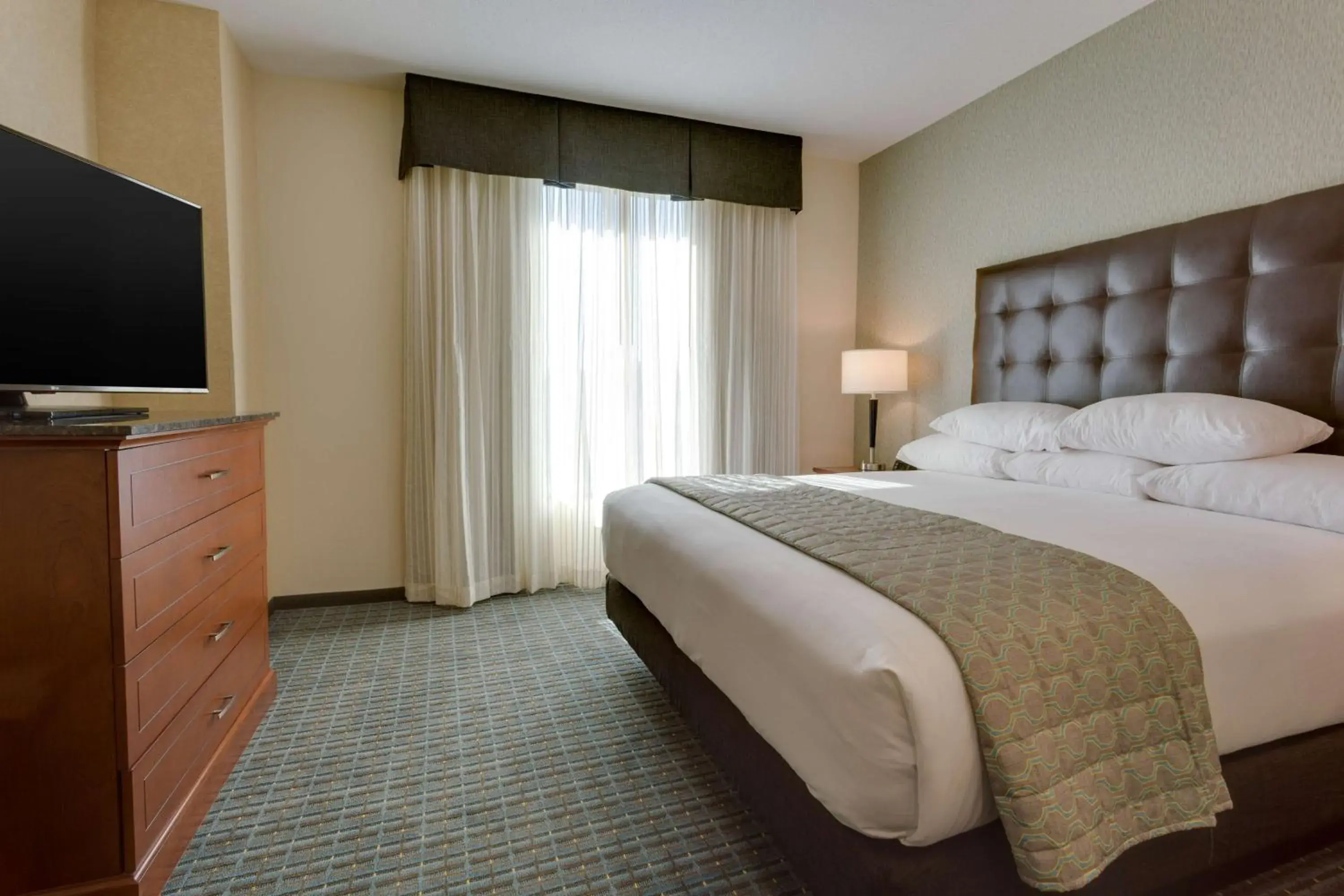 King Suite with Sofa Bed - Hearing Accessible in Drury Inn & Suites Gainesville King Suite with Sofa Bed - Hearing Accessible in Drury Inn & Suites Gainesville