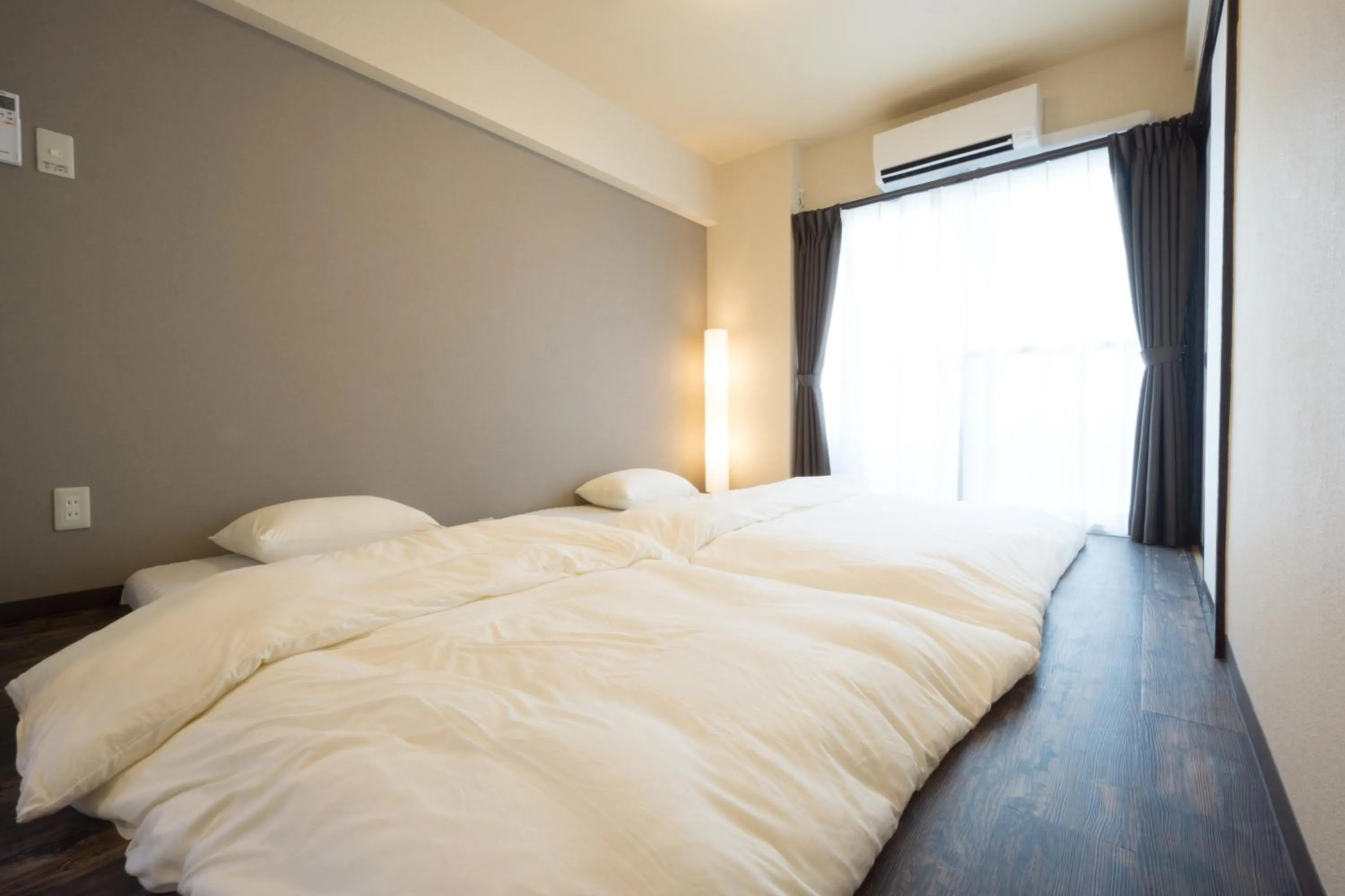 Bed in GOEN inn Tokyo