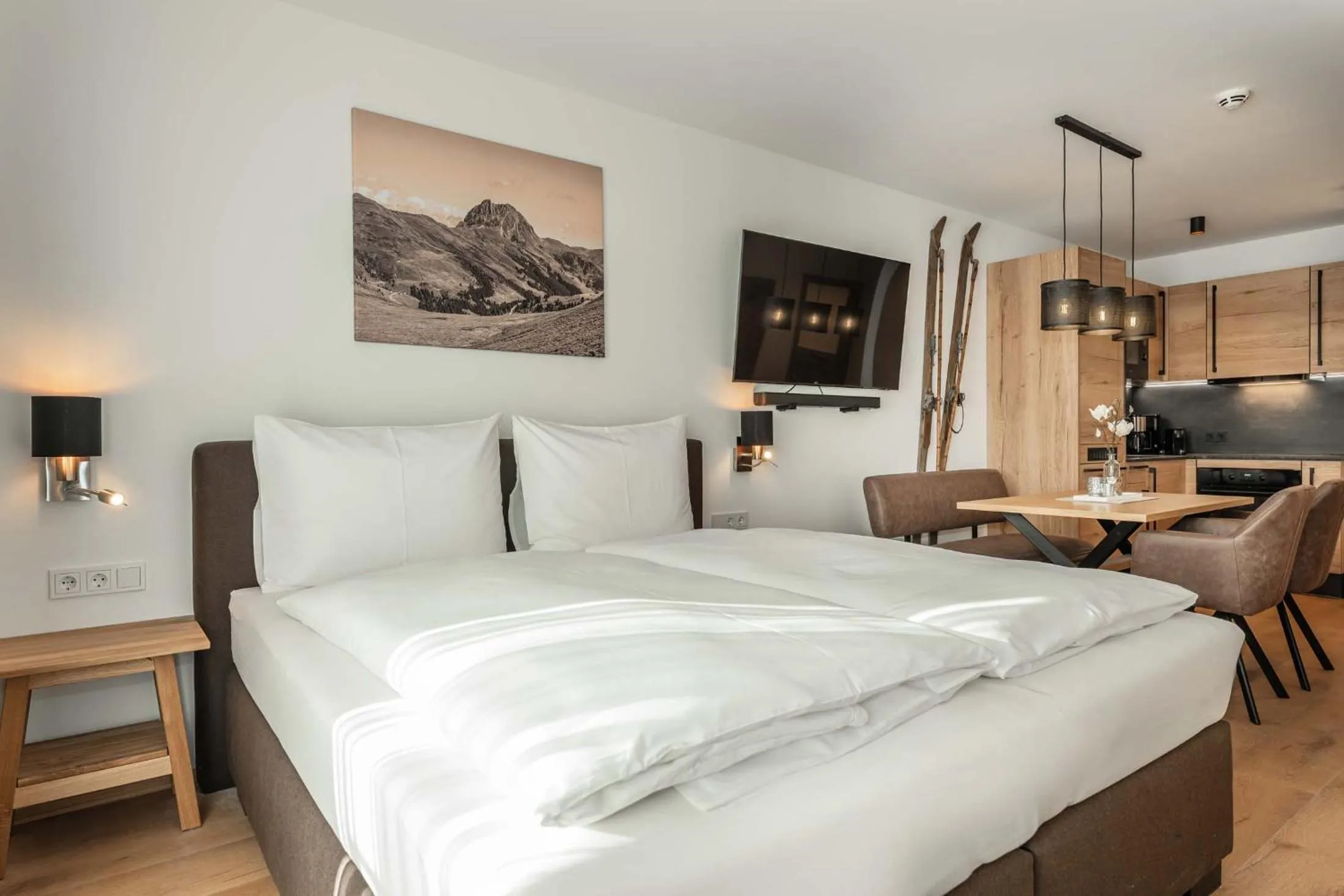 Bed in AlpenParks Hotel & Apartment Taxacher