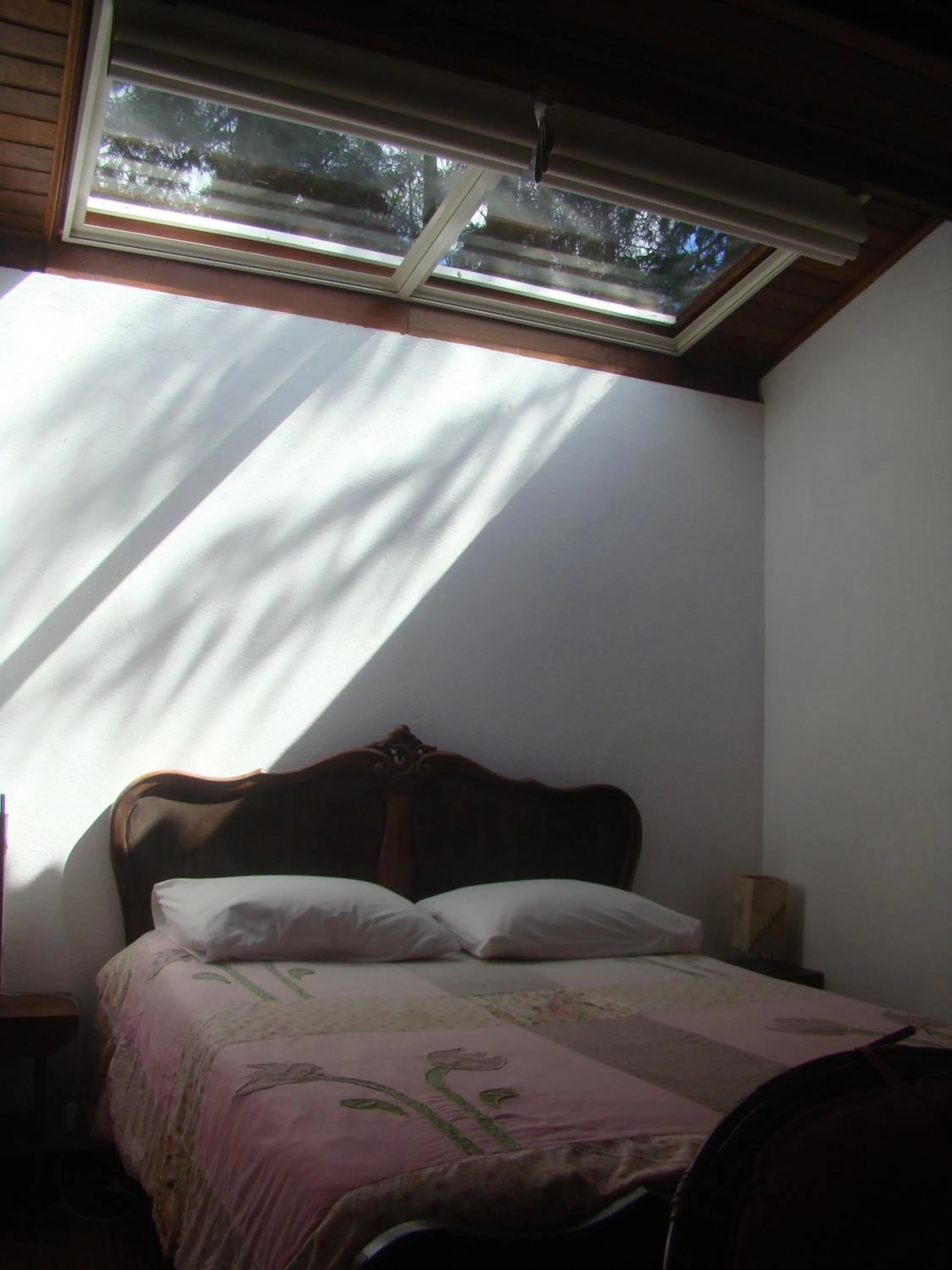 Bed in Pousada Trem das Cores