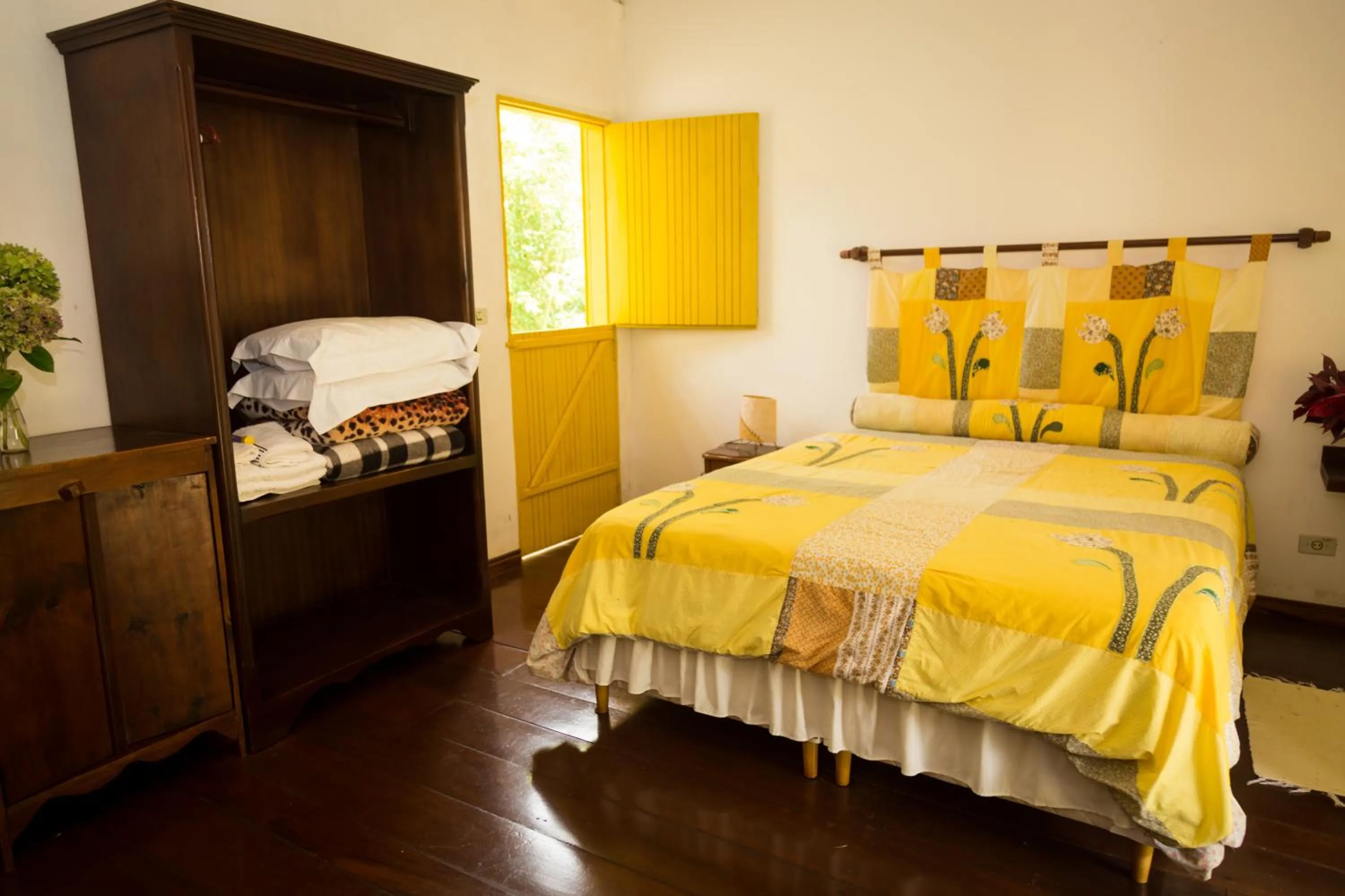 Bed in Pousada Trem das Cores