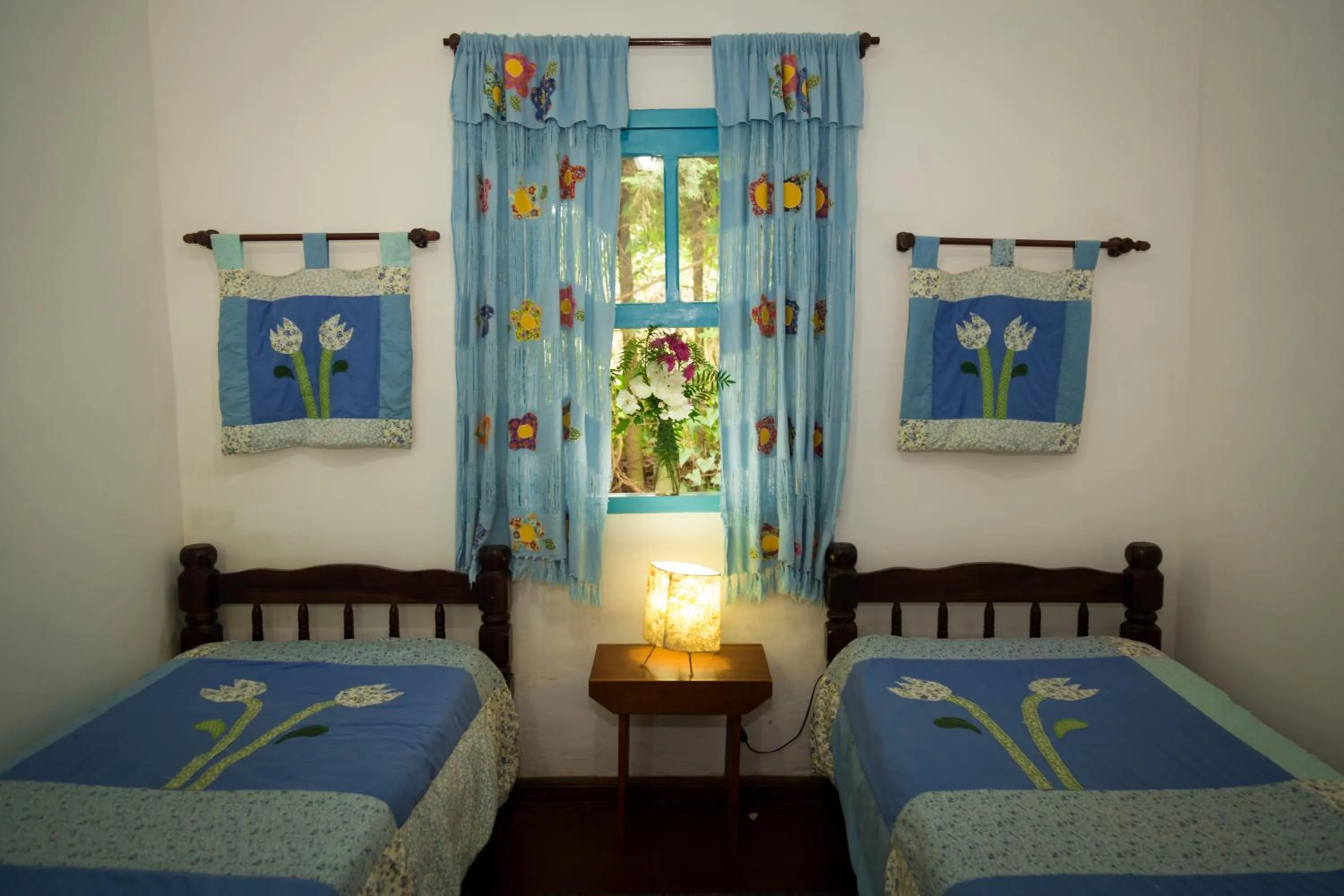 Bed in Pousada Trem das Cores