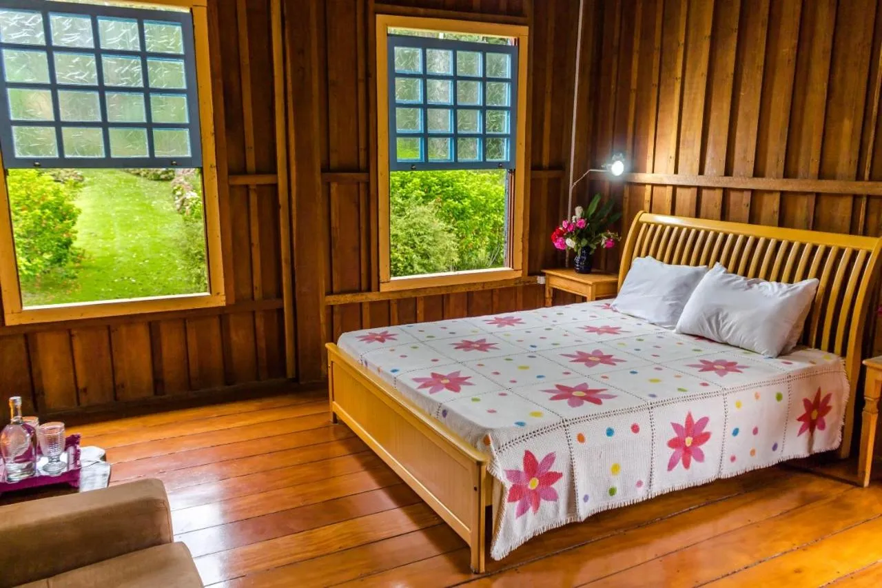 Bed in Pousada Trem das Cores