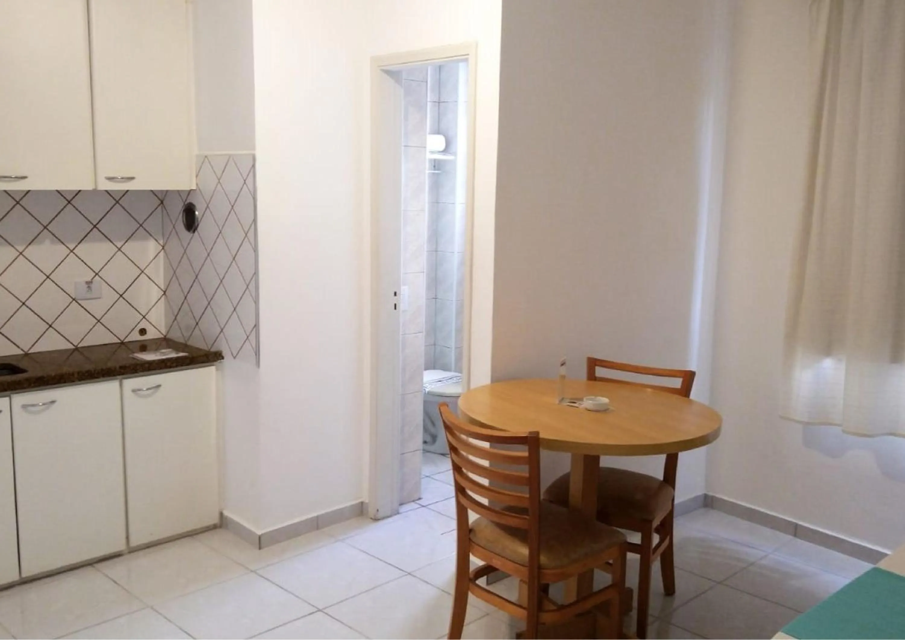 Dining area in Bela Cintra Flat Service