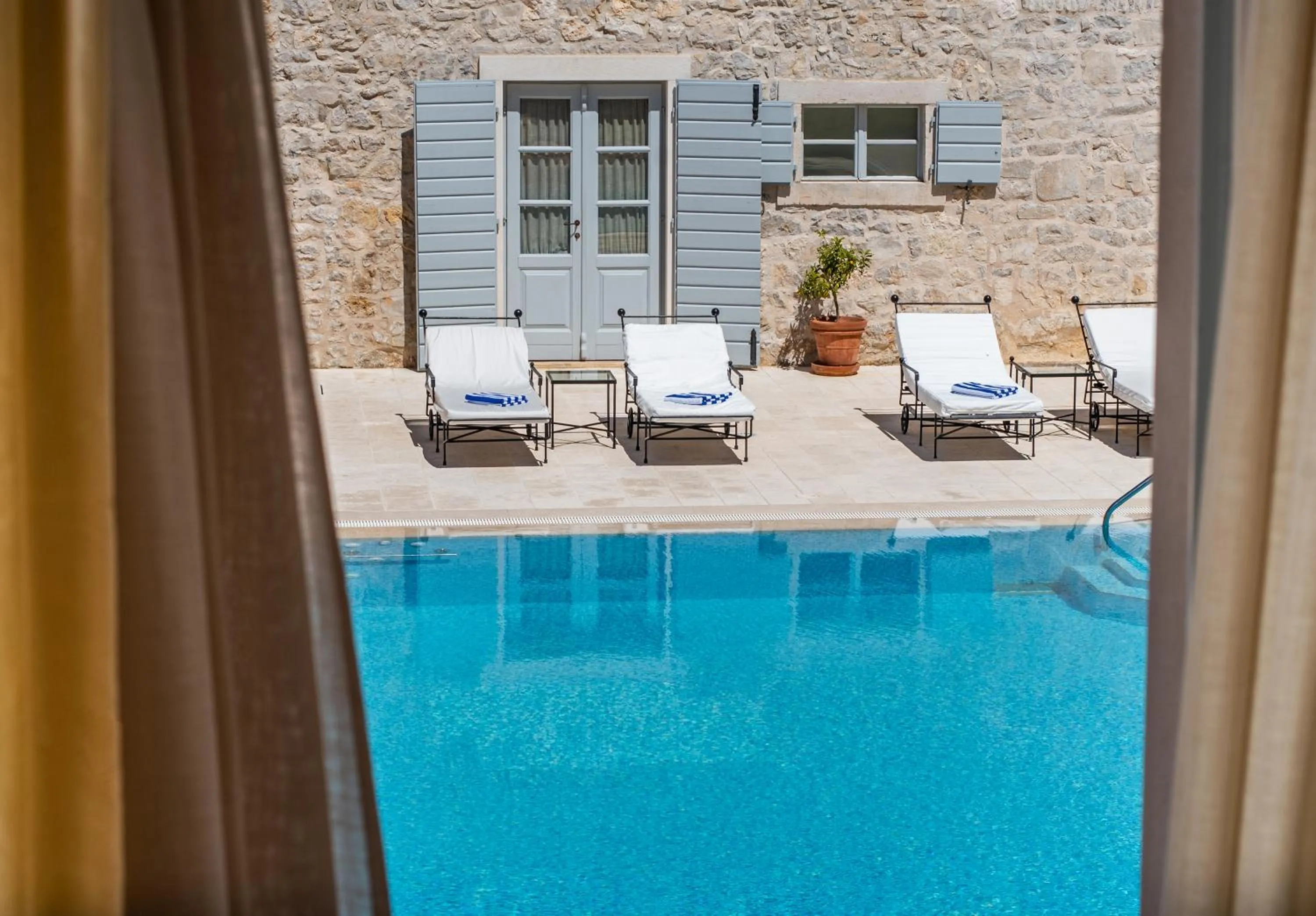 Pool view in Heritage Hotel Martinis Marchi