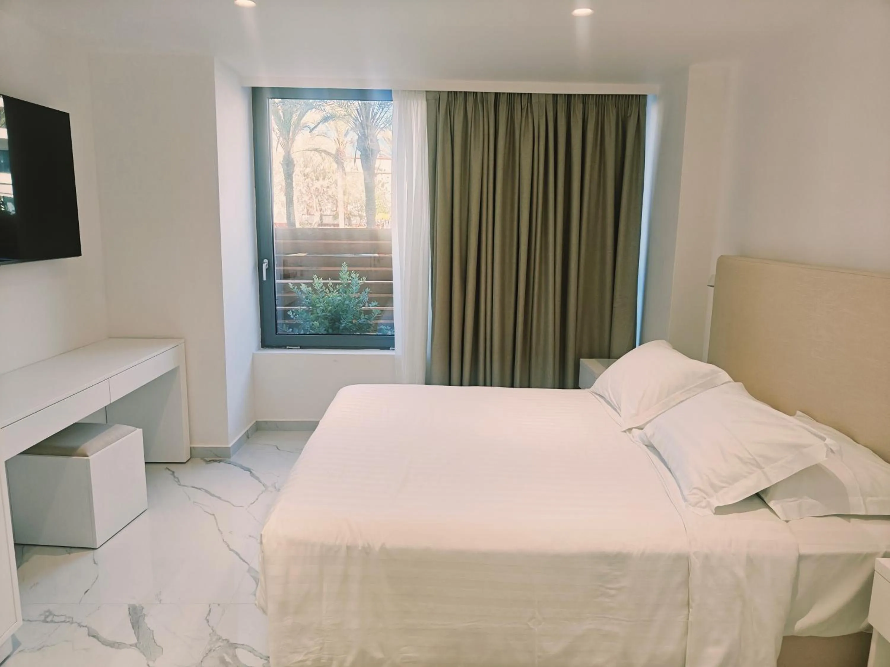 Bed in Ibiscus Hotel