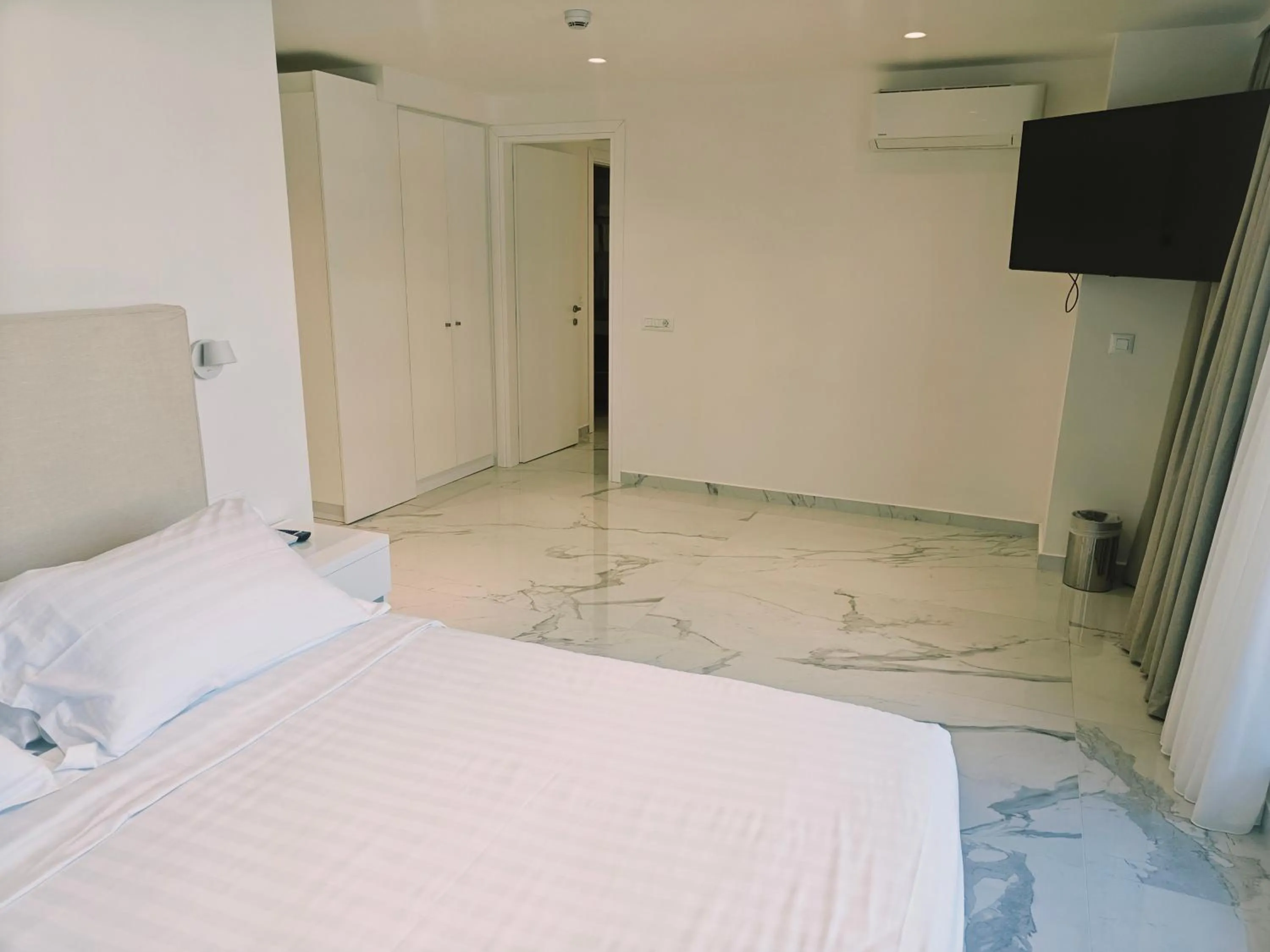 Bed in Ibiscus Hotel