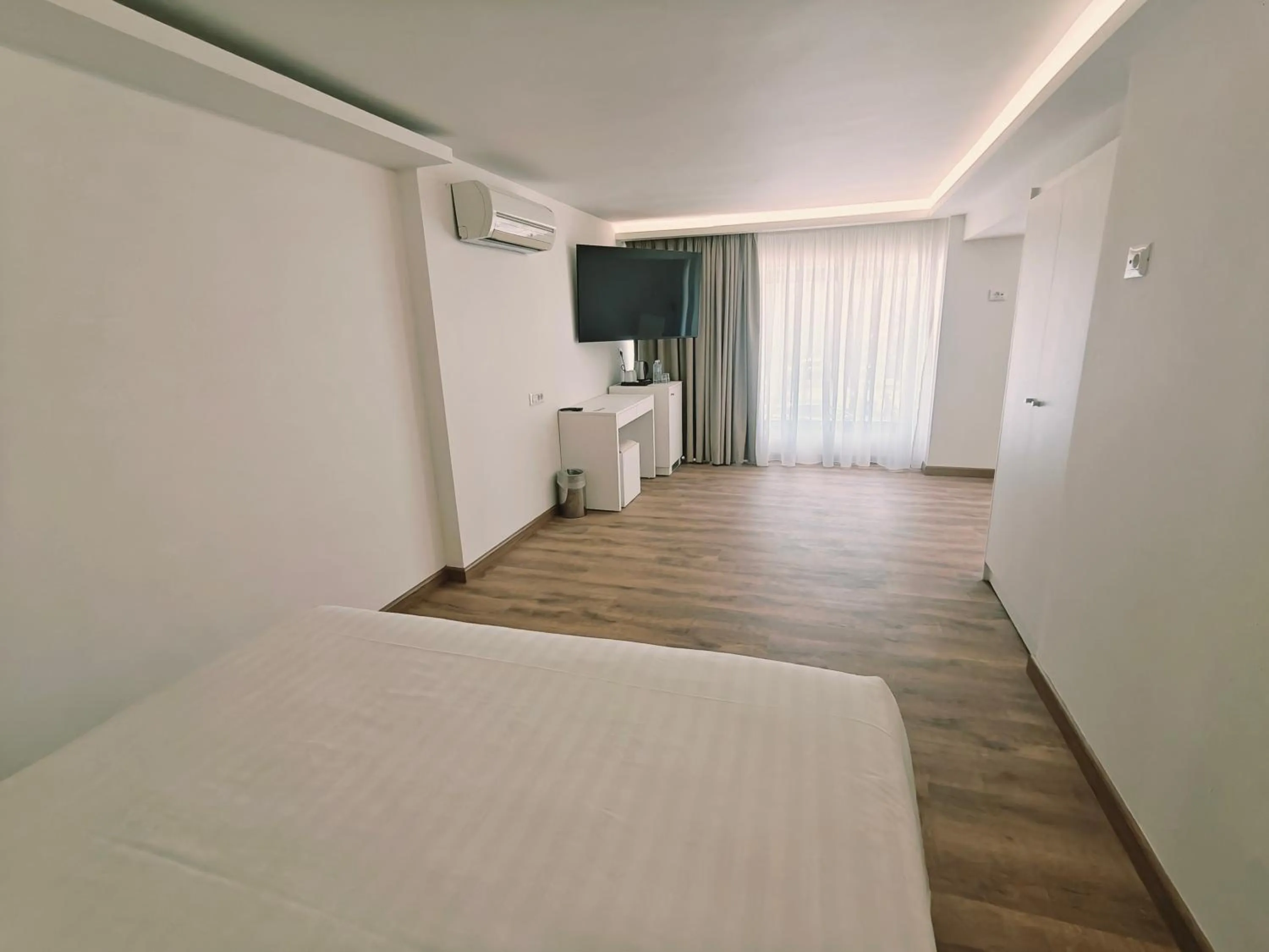 Bed in Ibiscus Hotel