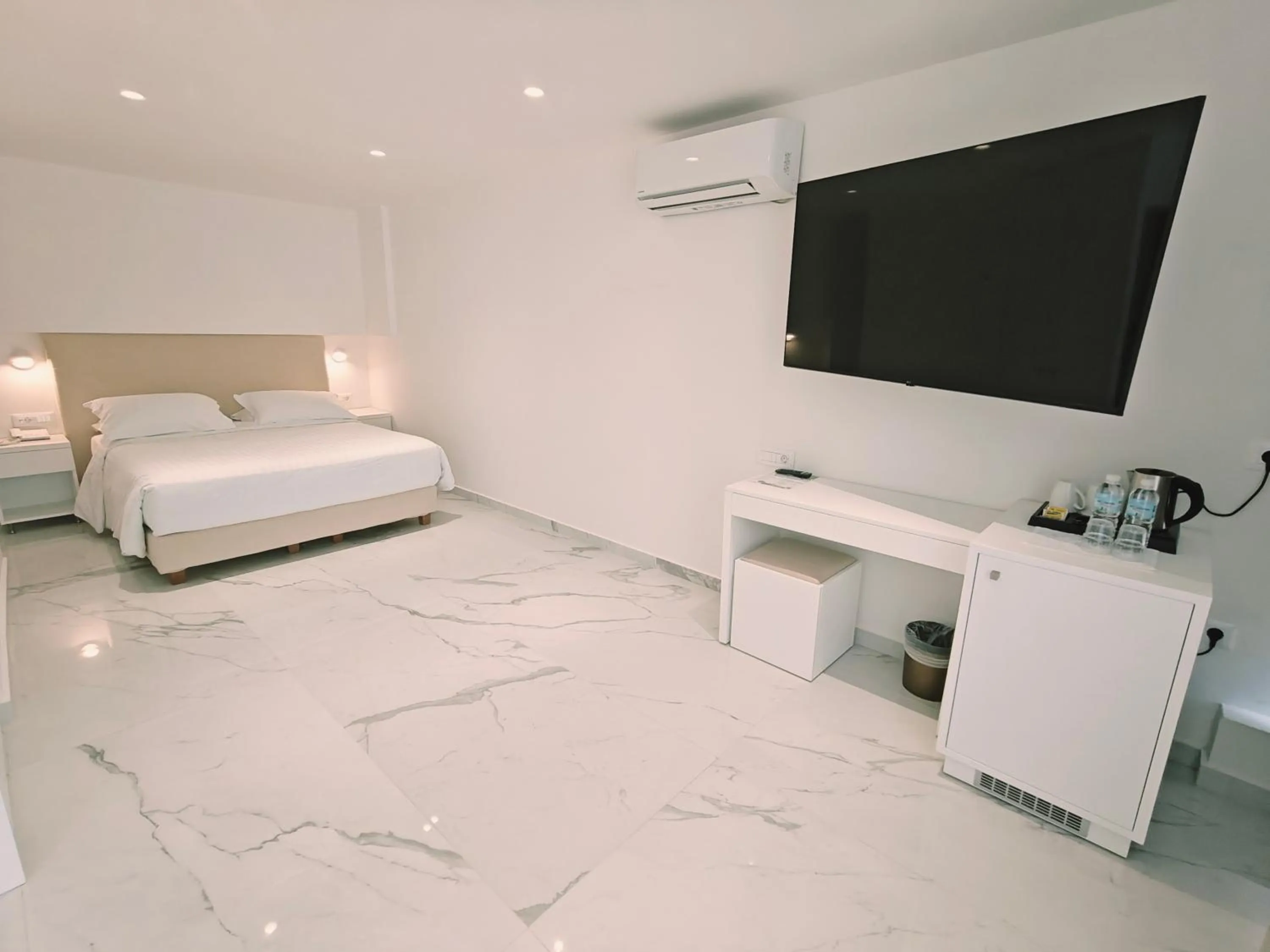 Bed in Ibiscus Hotel