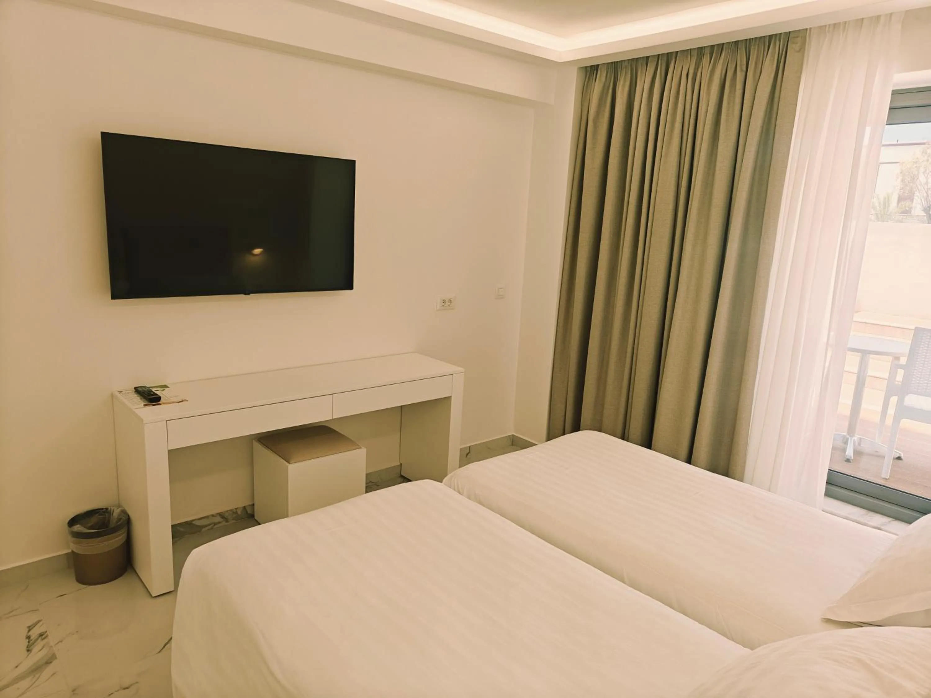 Bed in Ibiscus Hotel