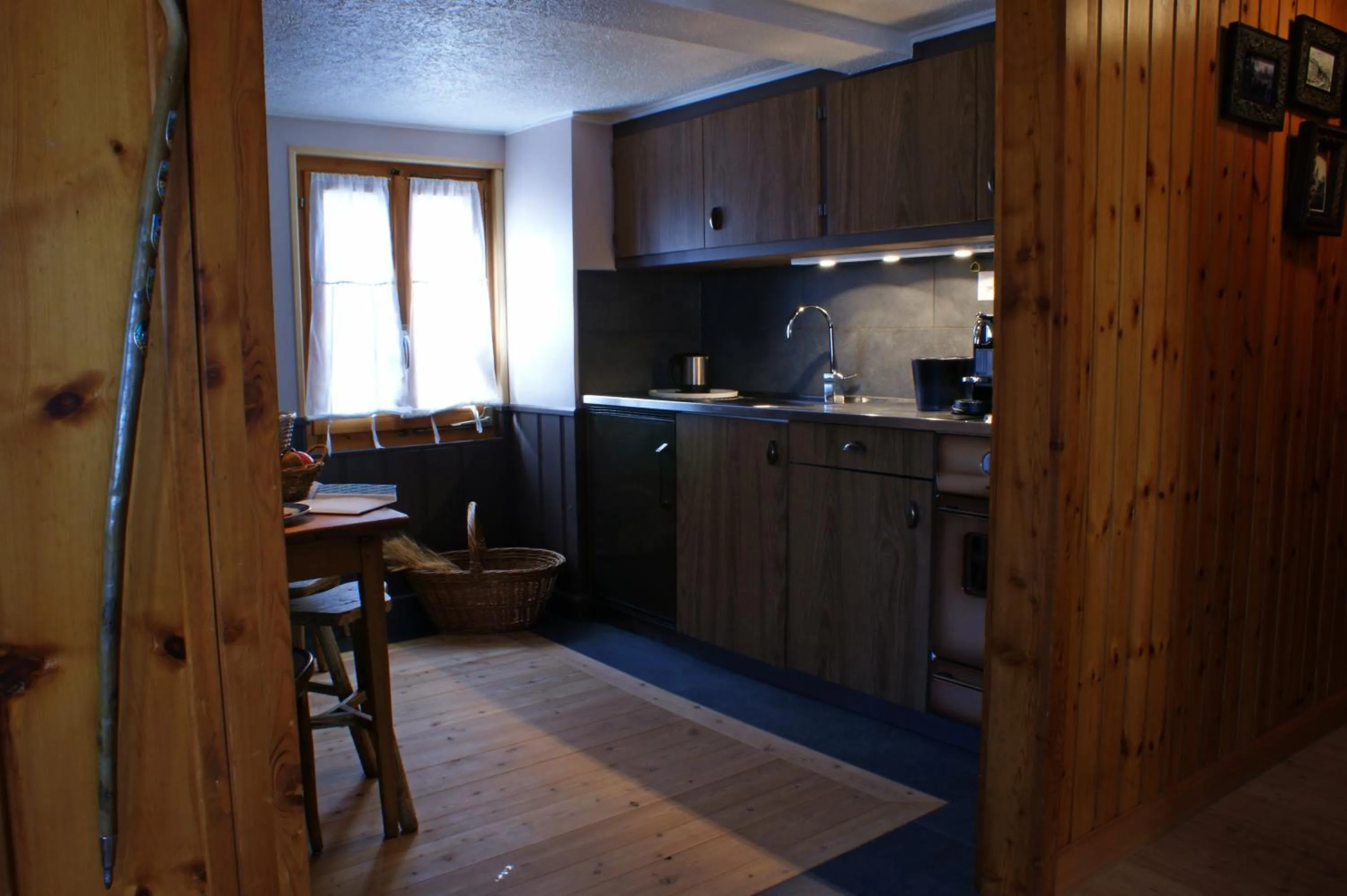 Kitchen or kitchenette in Hôtel Bella Tola & SPA