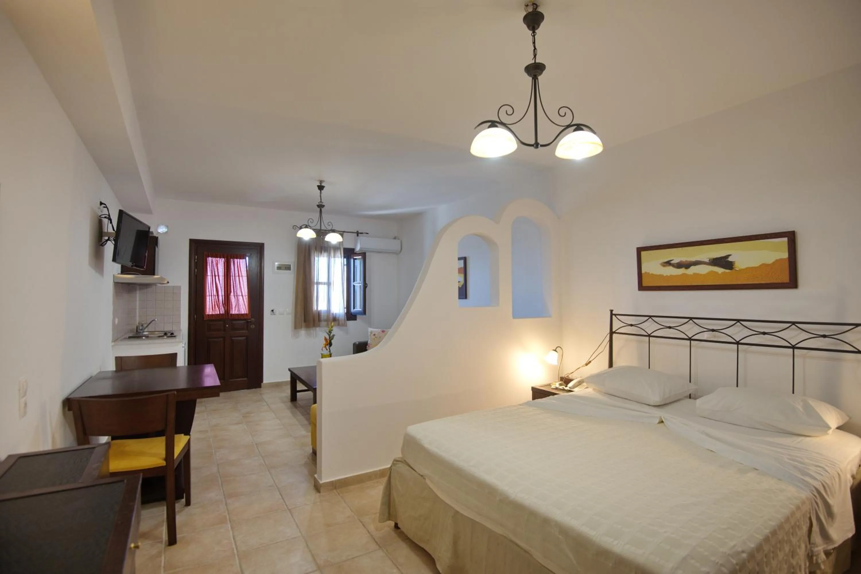 Kitchen or kitchenette, Bed in Yalis Hotel